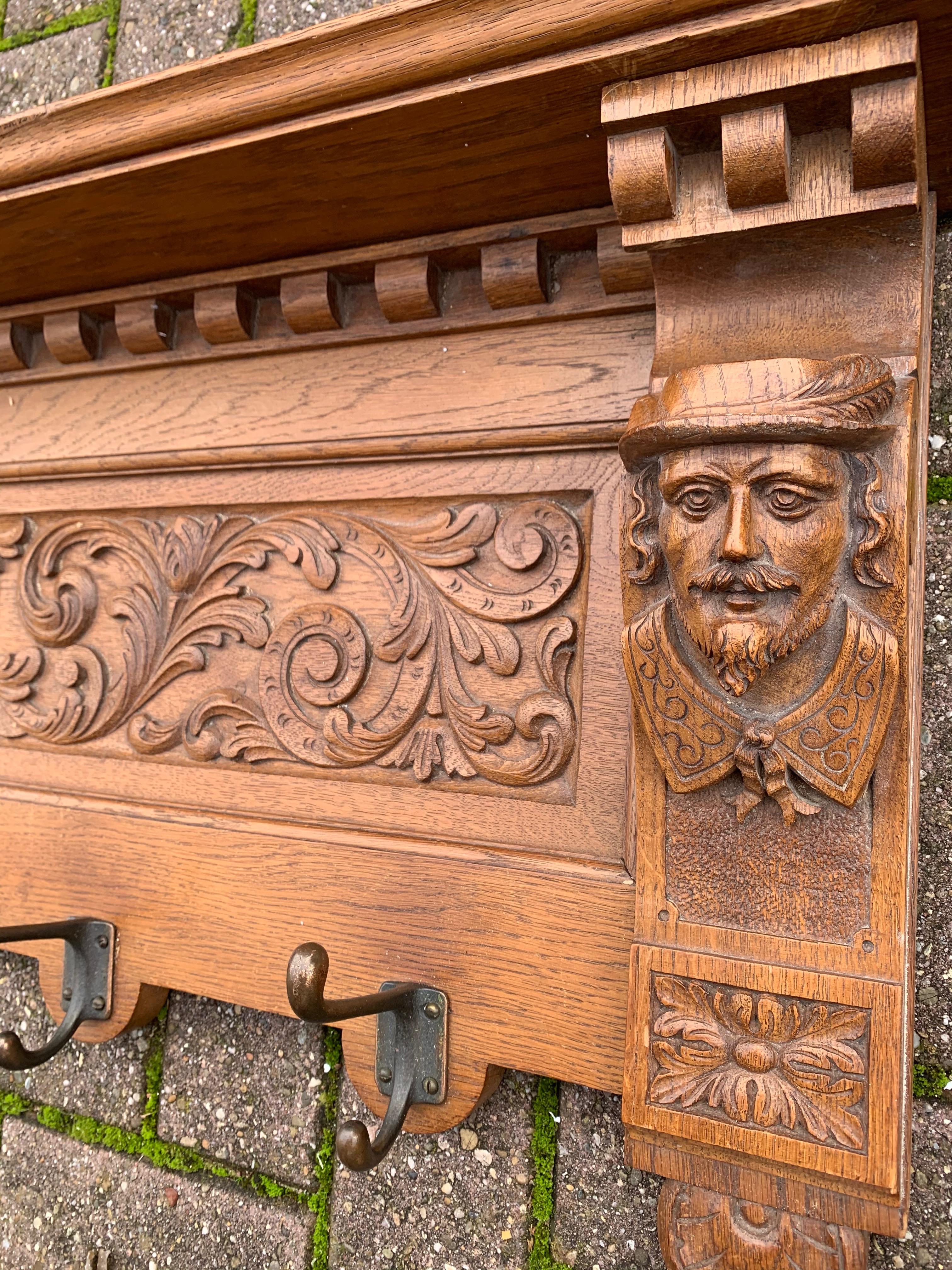 Hand-Carved Early 1900s Renaissance Revival Wall Coat Rack with Masks & Green Man Sculpture