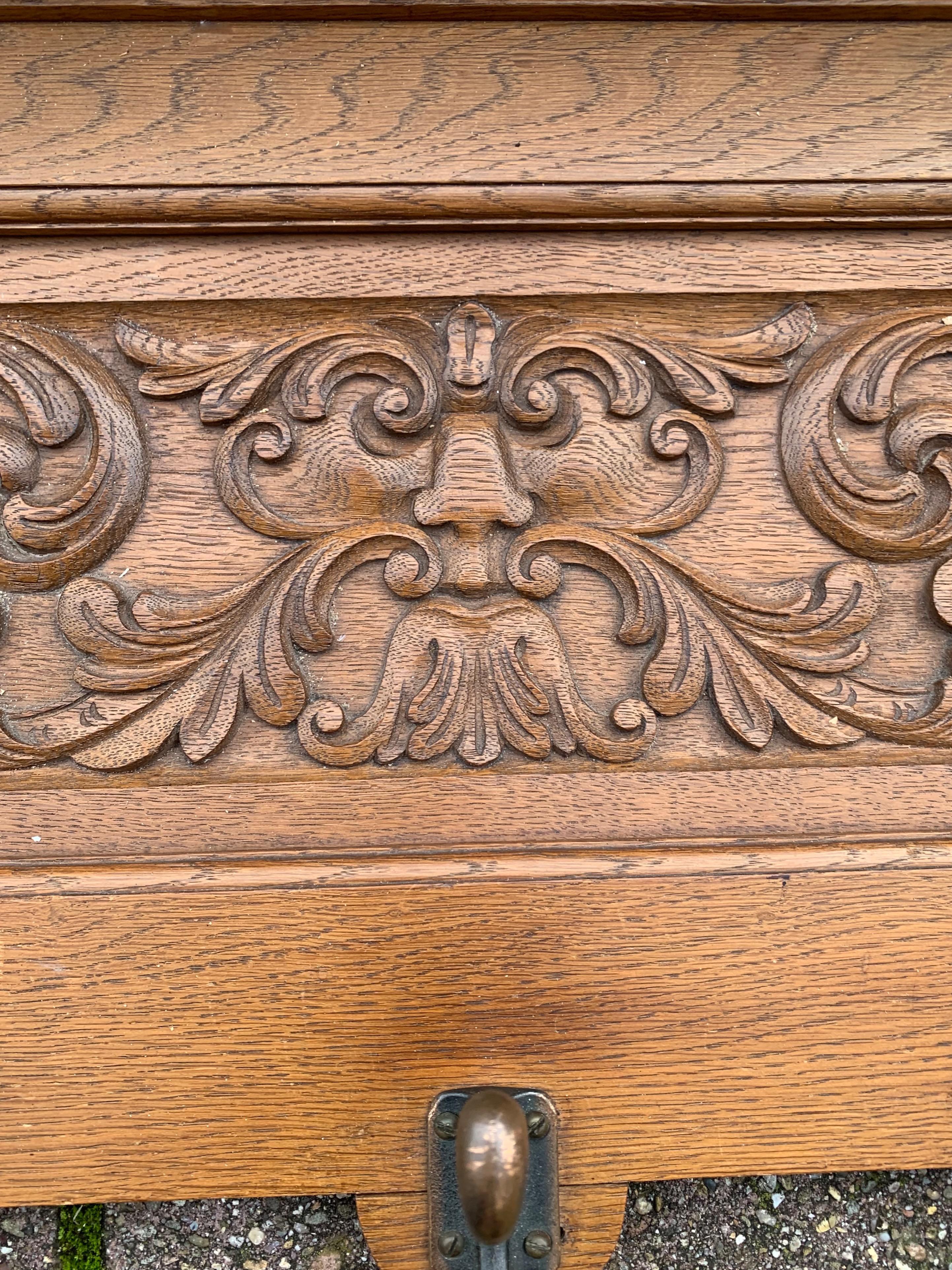 20th Century Early 1900s Renaissance Revival Wall Coat Rack with Masks & Green Man Sculpture