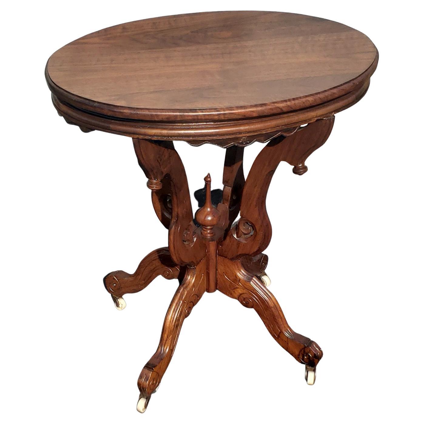 Early 1900s solid walnut Victorian accent table, tea table on wheels.
Table has been refinished and is excellent vintage condition.
Measures 27' W x 19.75
