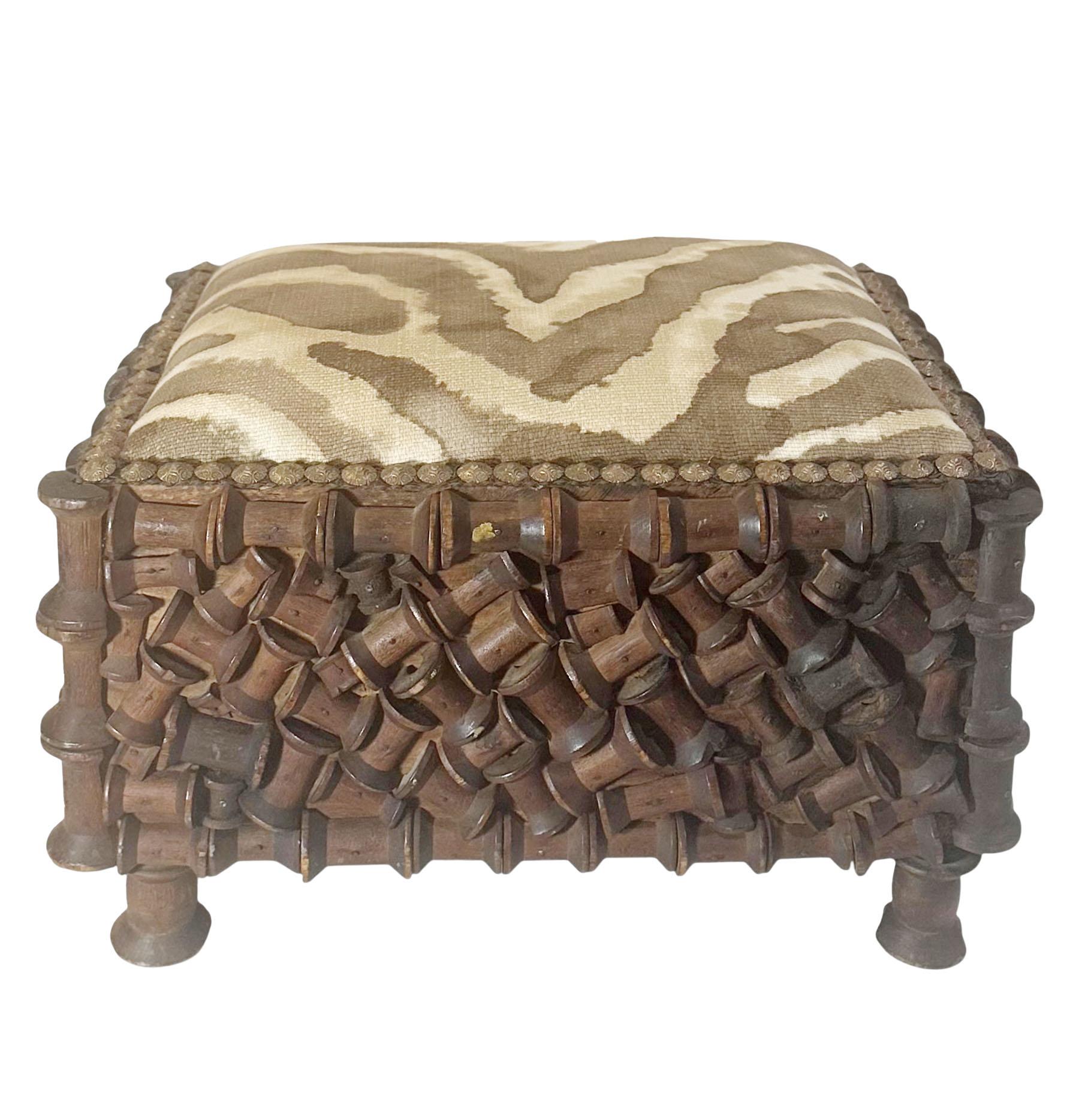 Early 1900s Tramp Art Spool Footstool Upholstered in Clarence House Linen For Sale