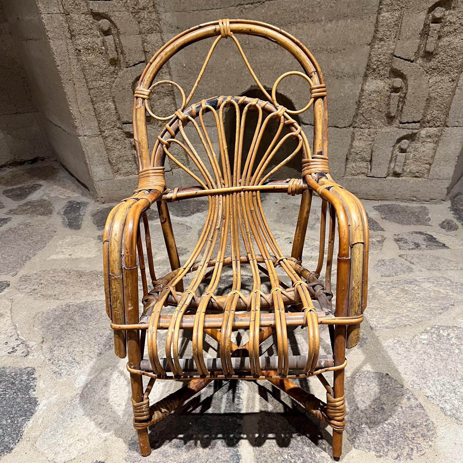 Early 1900s Vintage Children's Wicker Armchair Arched Rattan In Good Condition For Sale In Chula Vista, CA