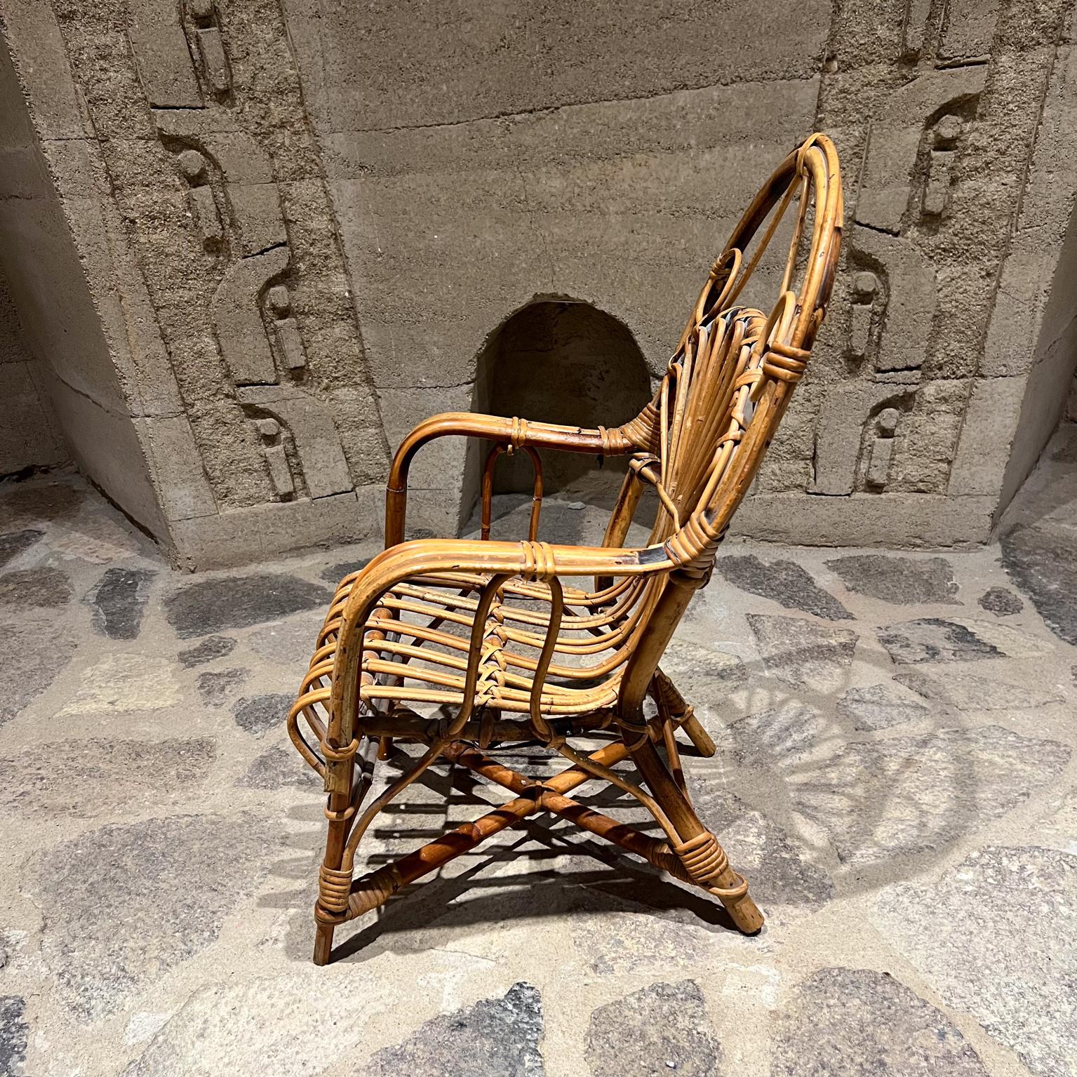 20th Century Early 1900s Vintage Children's Wicker Armchair Arched Rattan For Sale