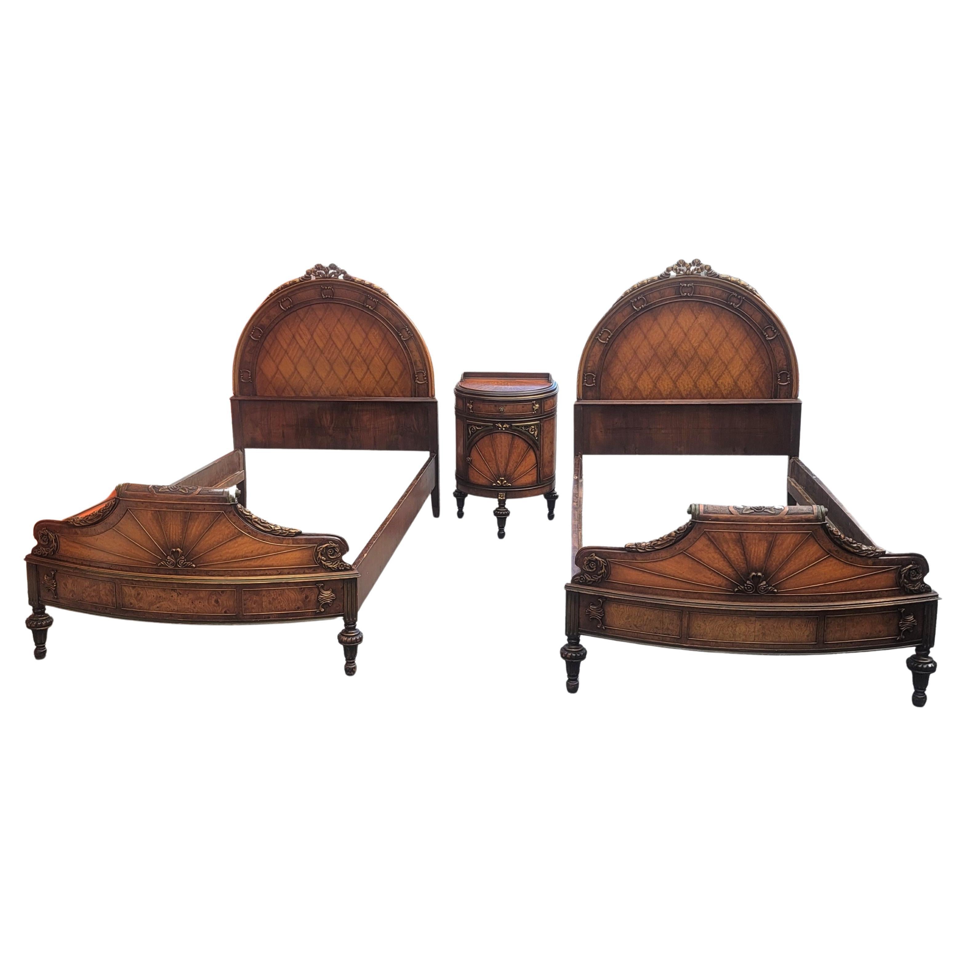 A very rare Early 1900s William & Mary Parcel Gilt Twin Bedroom Set. Made out of walnut, kingwood, book matched burl veneer. 
Set includes:
-2 Single beds with amazing real wood carvings and gilts on the headboard as well the footboard Measuring