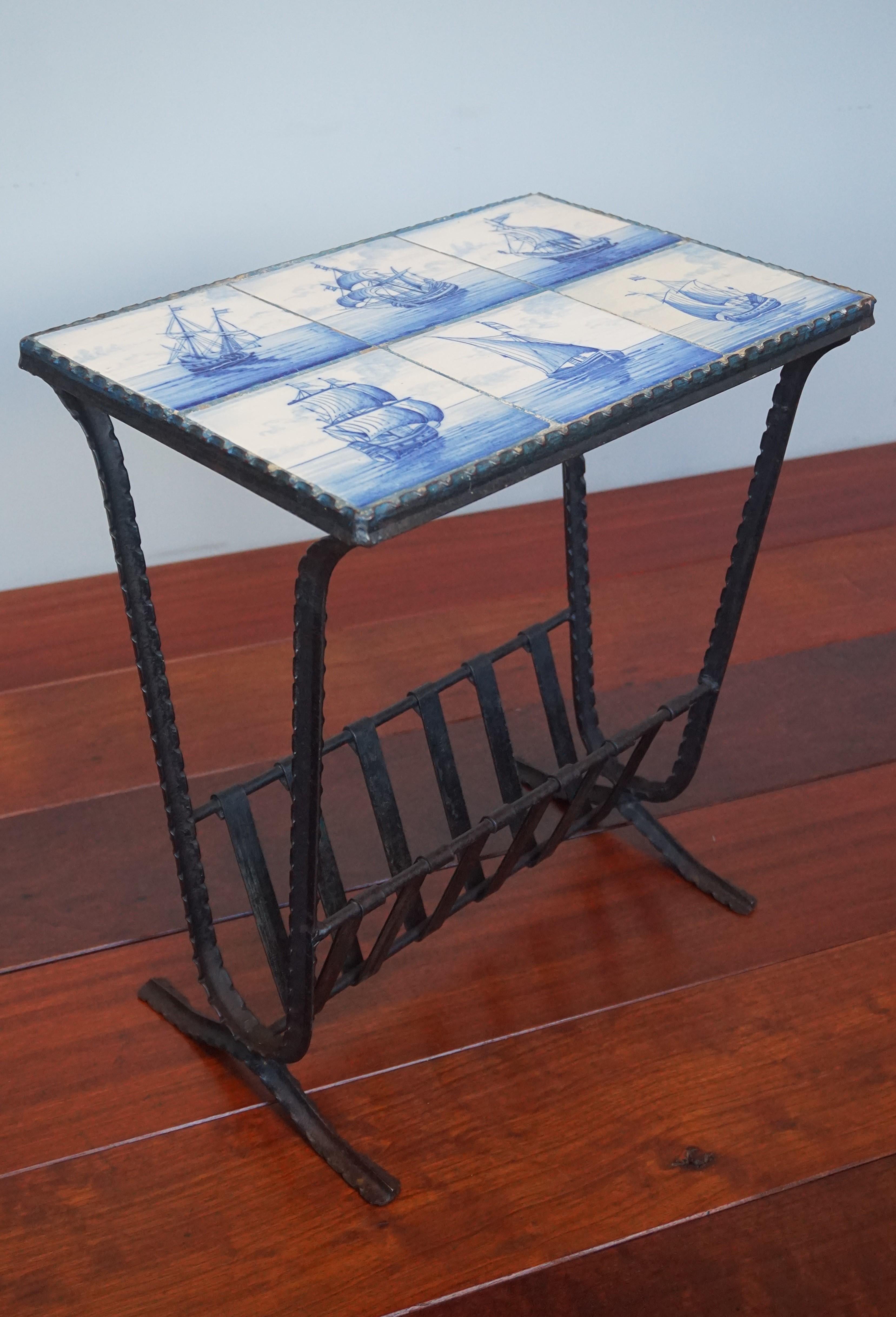 All handcrafted and rare magazine Stand / end table with beautiful inlaid tiles.

It is not every day that we get to offer a table that is made of this unique combination of materials. You have to be an out-of-the-box-thinker to come up with the