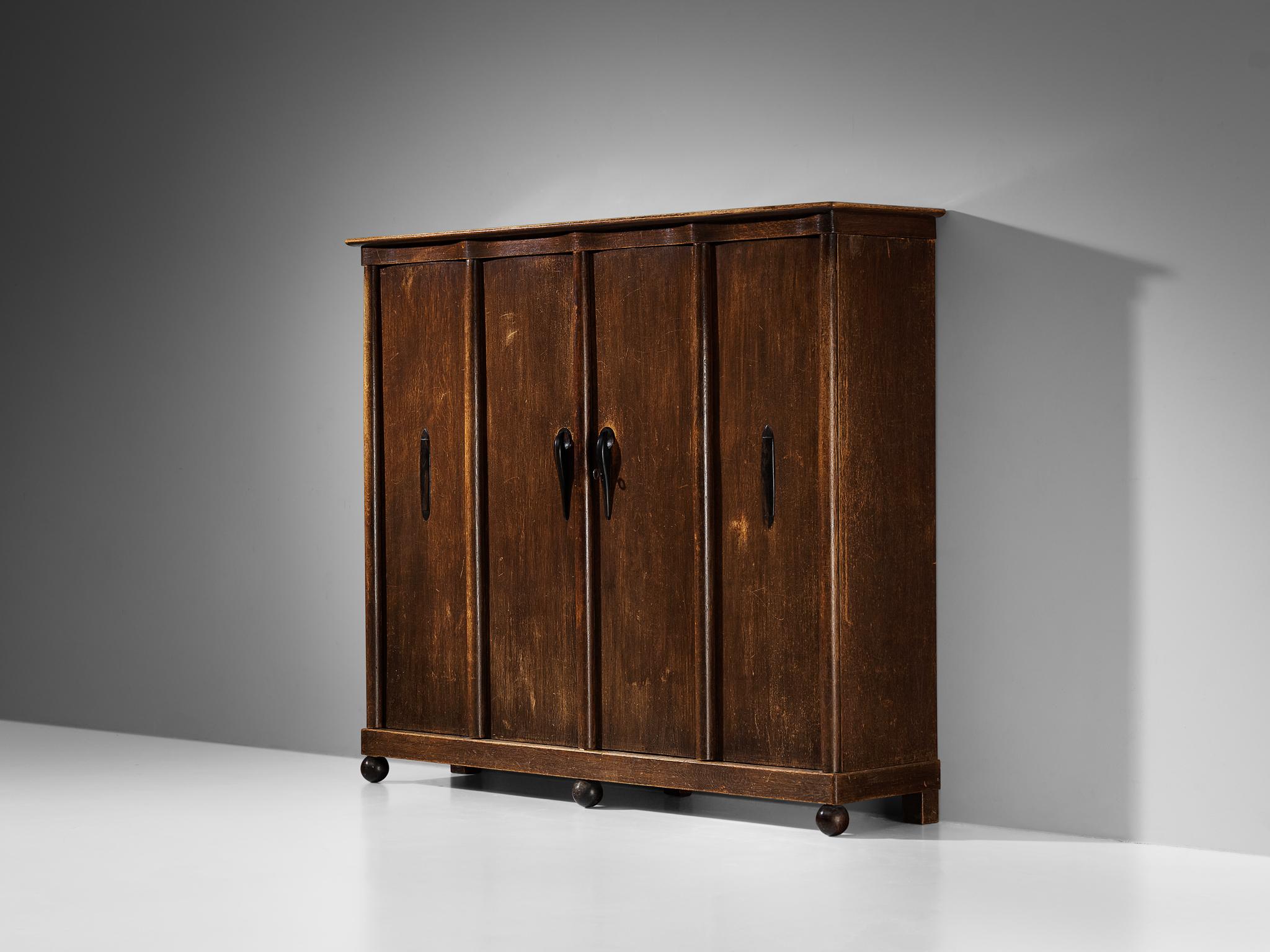 Willem Penaat, sideboard, oak, The Netherlands, early 1920s

Made in the early 1920s, this delightful sideboard is designed by the Dutch interior designer Willem Penaat (1875-1957). Before 1925, A large part of his work was influenced by the