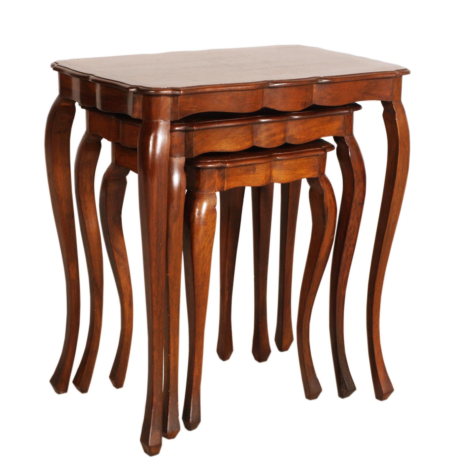 An elegant trio of nesting tables in solid walnut wood, featuring cabriole legs and scalloped tabletops with graceful curved profiles. The shellac or natural varnish finish highlights the rich wood grain, imparting a desirable patina and refined
