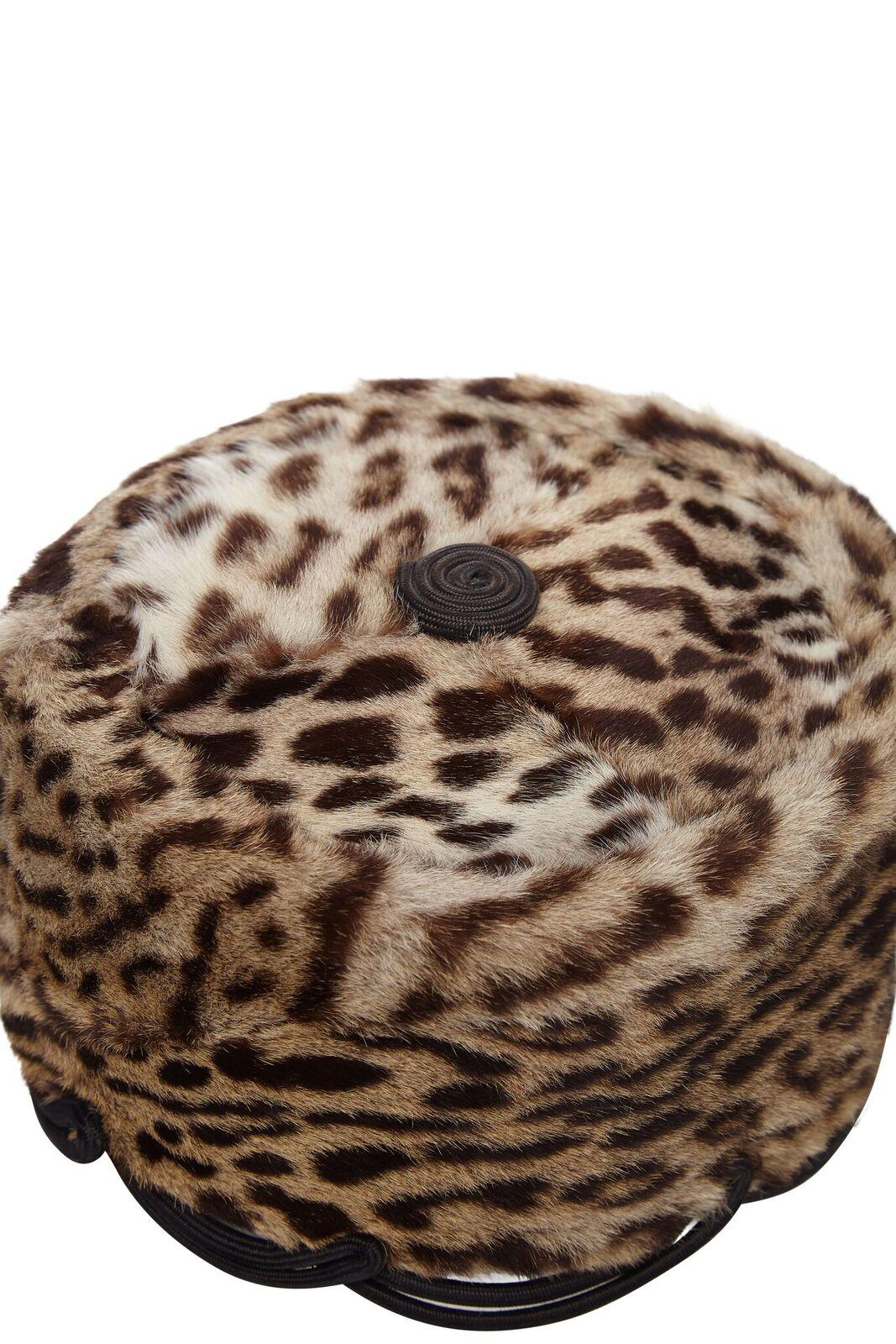 This glamorous early 1940s ocelot fur pillbox hat is incredibly rare, in superb vintage condition and previously owned by American socialite Jolie Gabour, mother of Za Za by repute. The soft fur is lined in silk satin and trimmed with a stiff boned