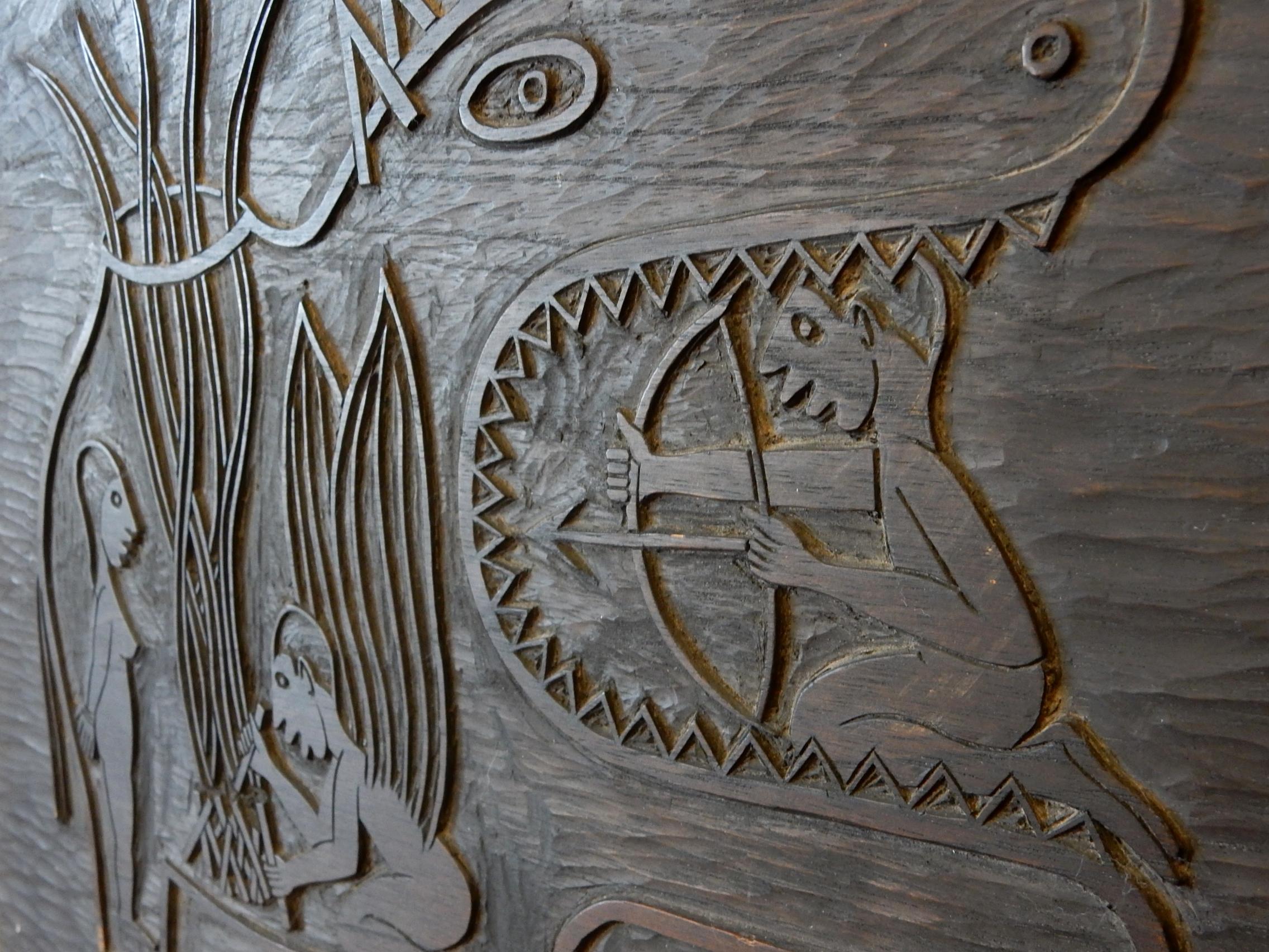 Chip carved sculpture on a hardwood board. This is an early example of art by Edwin Scheier
from his teaching years at the University of Delaware, circa 1940s.
This was to be a repetitious scene throughout much of his drawings and paintings.
It's