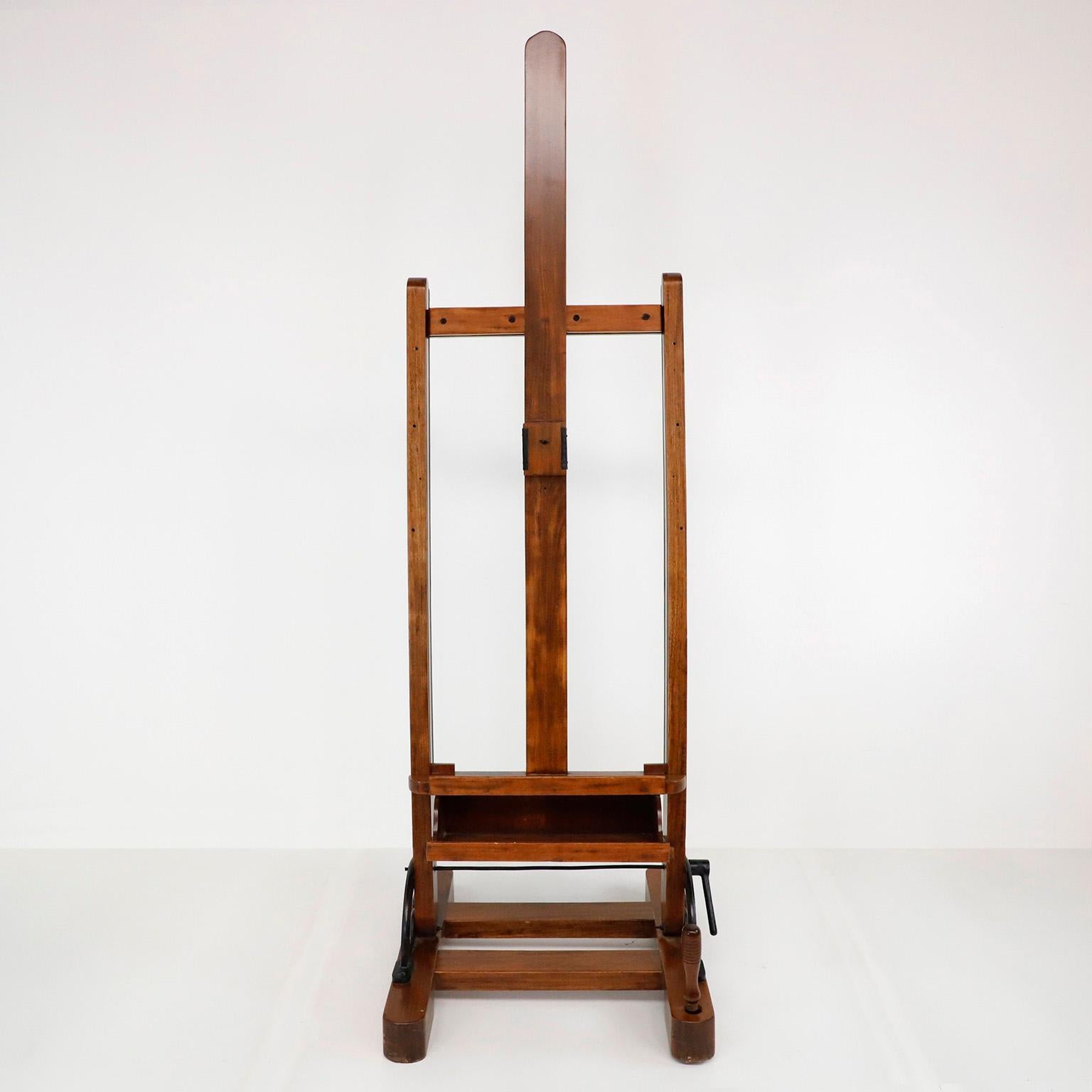 circa 1950, we offer this Rare Mexican wood adjustable Artist Easel, made in tiger Oak wood This easel has the same design as those currently in the study of Diego Rivera and Frida Kahlo, ready for the next Frida Kahlo! Height is adjustable.