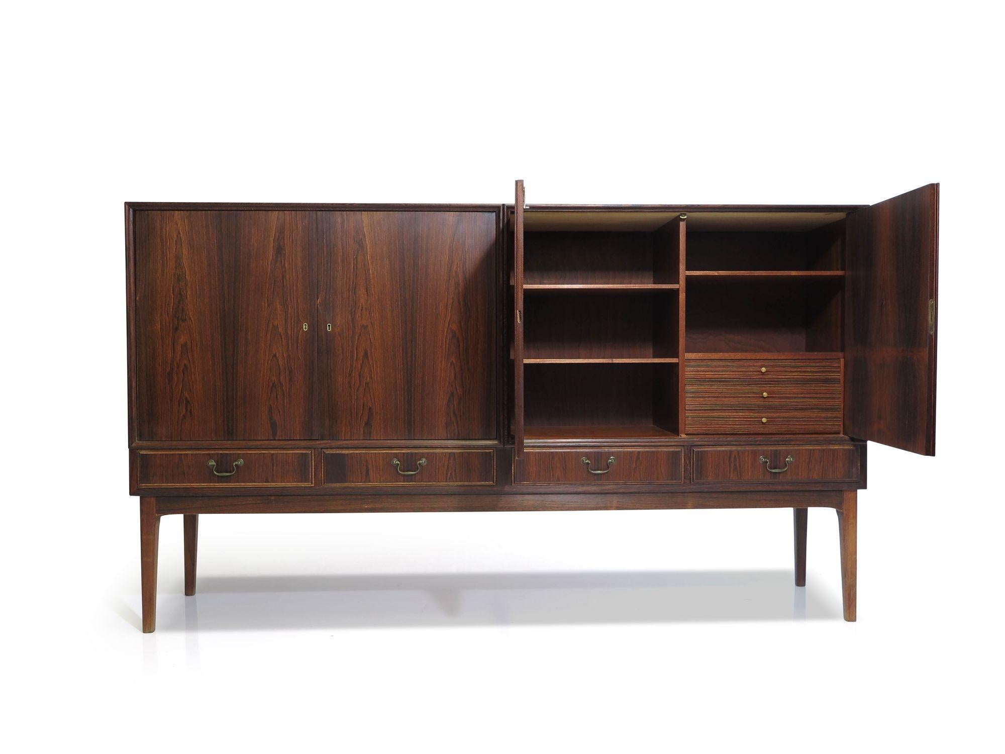 Oiled Early 1950's Brazilian Rosewood Danish Sideboard Cabinet For Sale