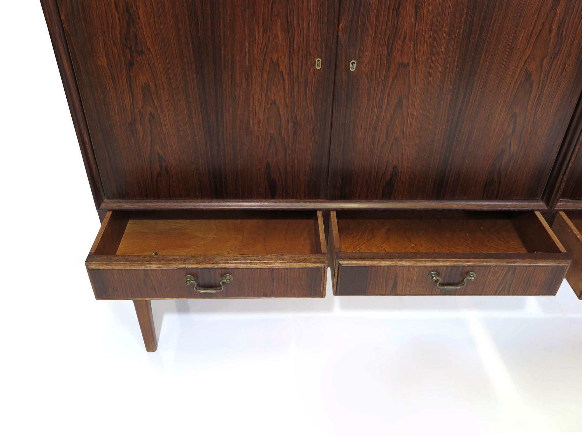 20th Century Early 1950's Brazilian Rosewood Danish Sideboard Cabinet For Sale