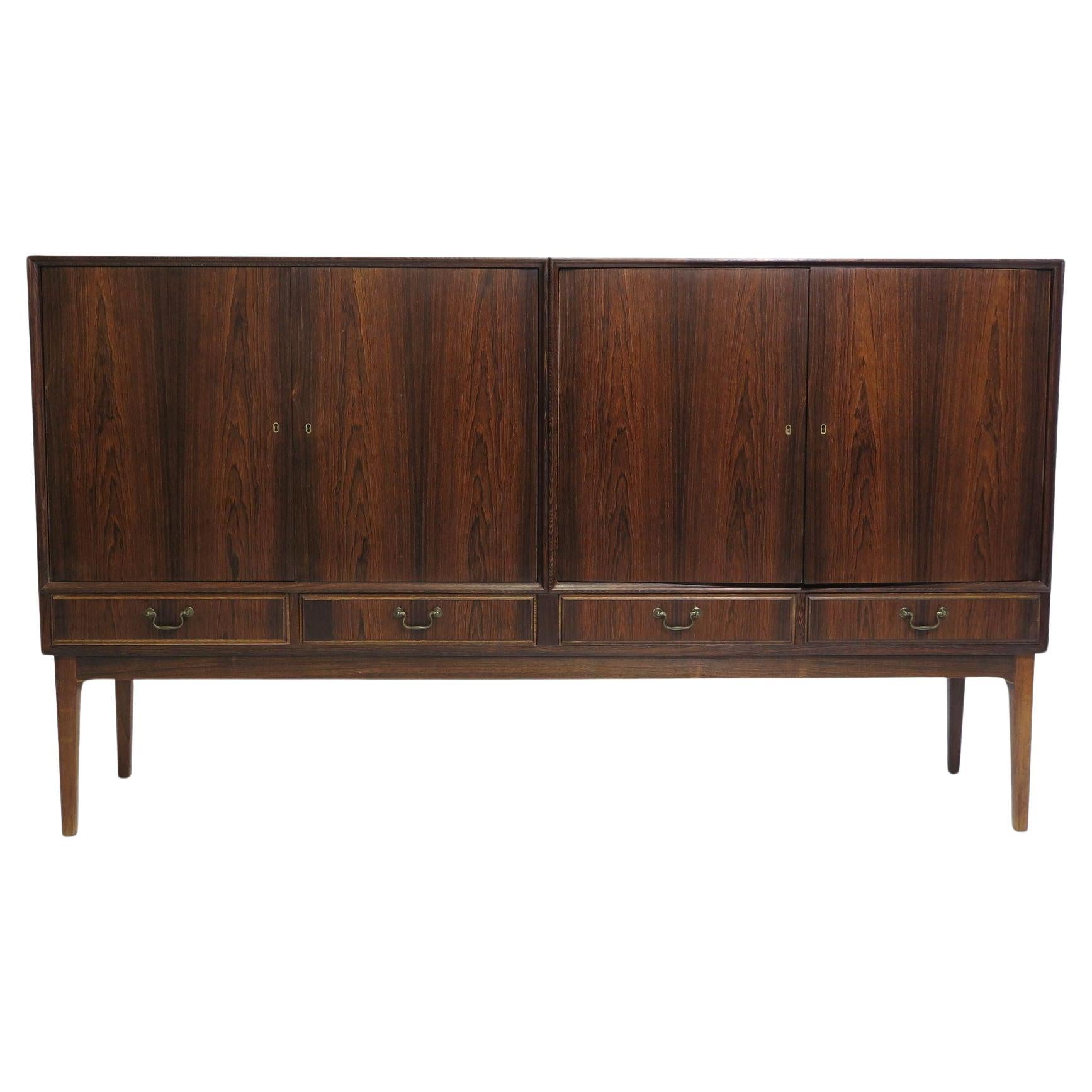 Early 1950's Brazilian Rosewood Danish Sideboard Cabinet For Sale