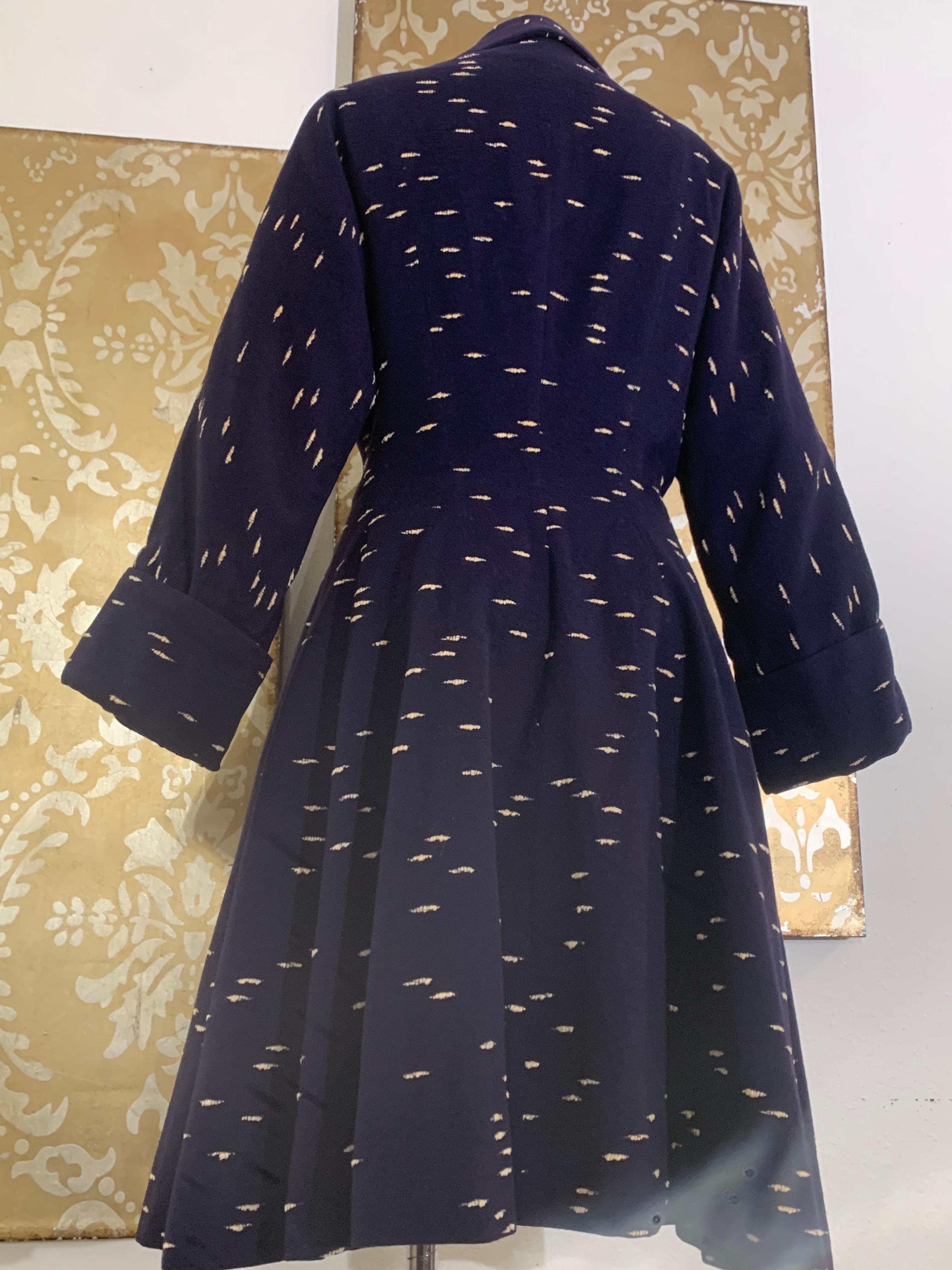 Early 1950s Lilli Ann Navy Wool/Cashmere Fit & Flare Coat w Large Collar & Cuffs:  Fashioned, in classic Lilli Ann style  from a distinctive fabric that places large cream-color slubs against a rich navy background of cashmere/wool blend. Large,