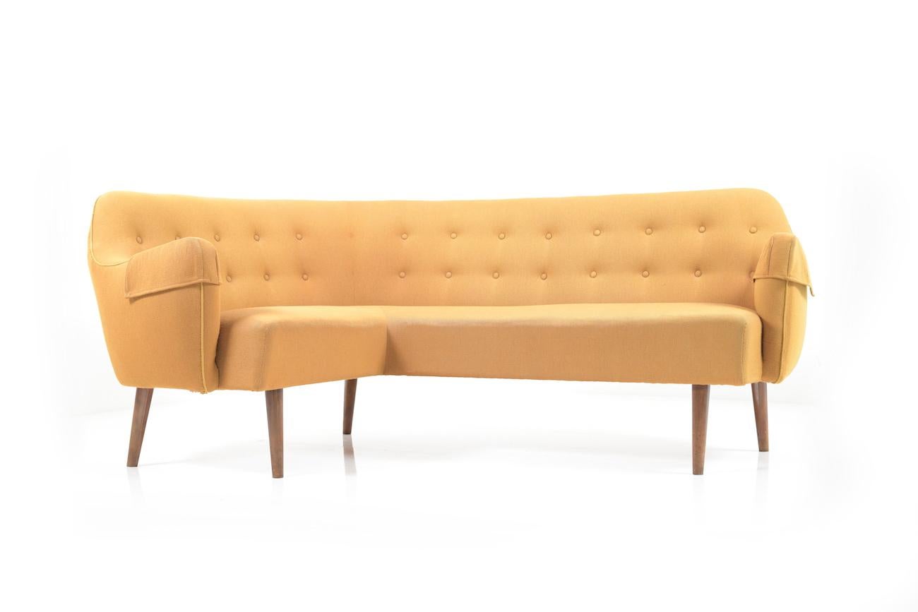 Mid century dansih corner sofa. Early production. Upholstery in original yellow frabric. Around 1950-52