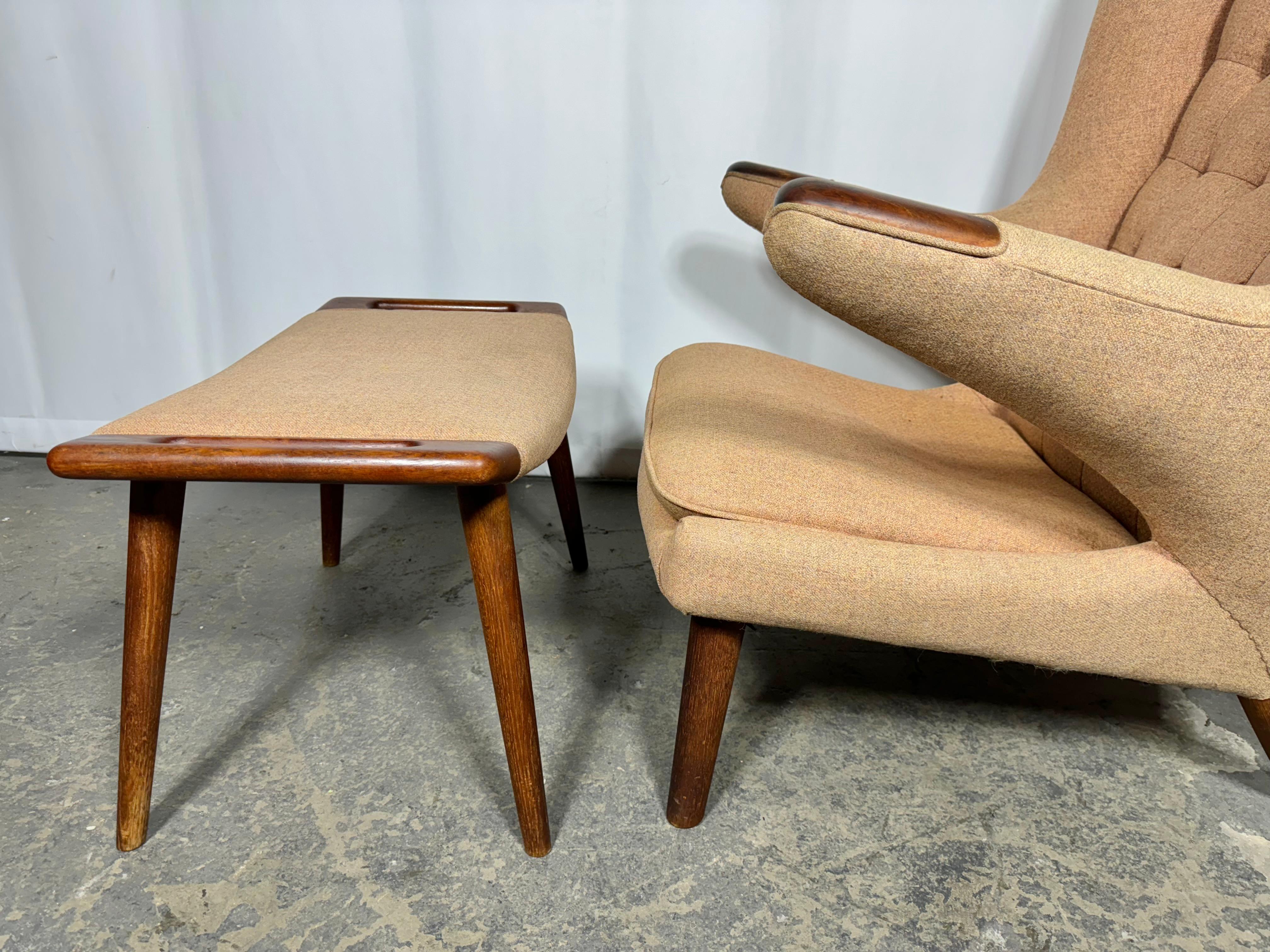 Classic early production Papa Bear chair and Ottoman designed by Hans Wegner manufactured by A.P. Stolen.Chair and ottoman retains original fabric as well as original finish to the wood..Very useable but has some staining , fading, Chair and ottoman