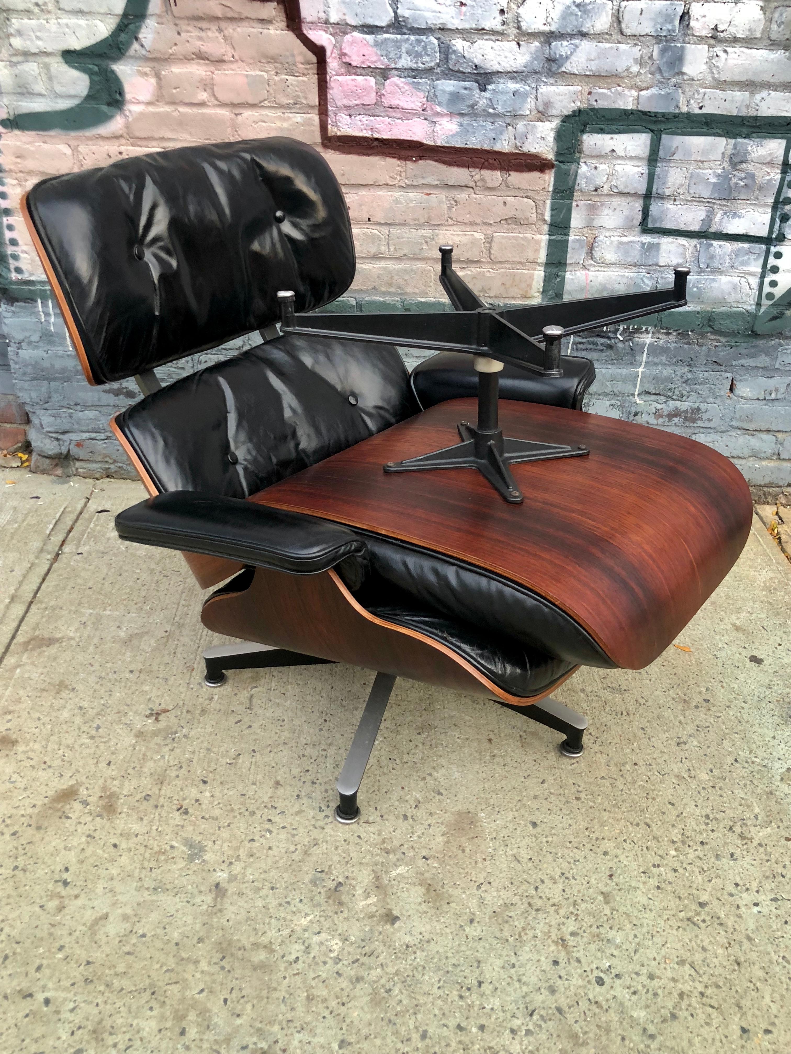 Gorgeous Herman Miller Eames lounge chair and ottoman, circa early 1960s. Signed and in original condition. Purchased from family of original owner. Down filled black leather cushions. A classic example of the iconic design.