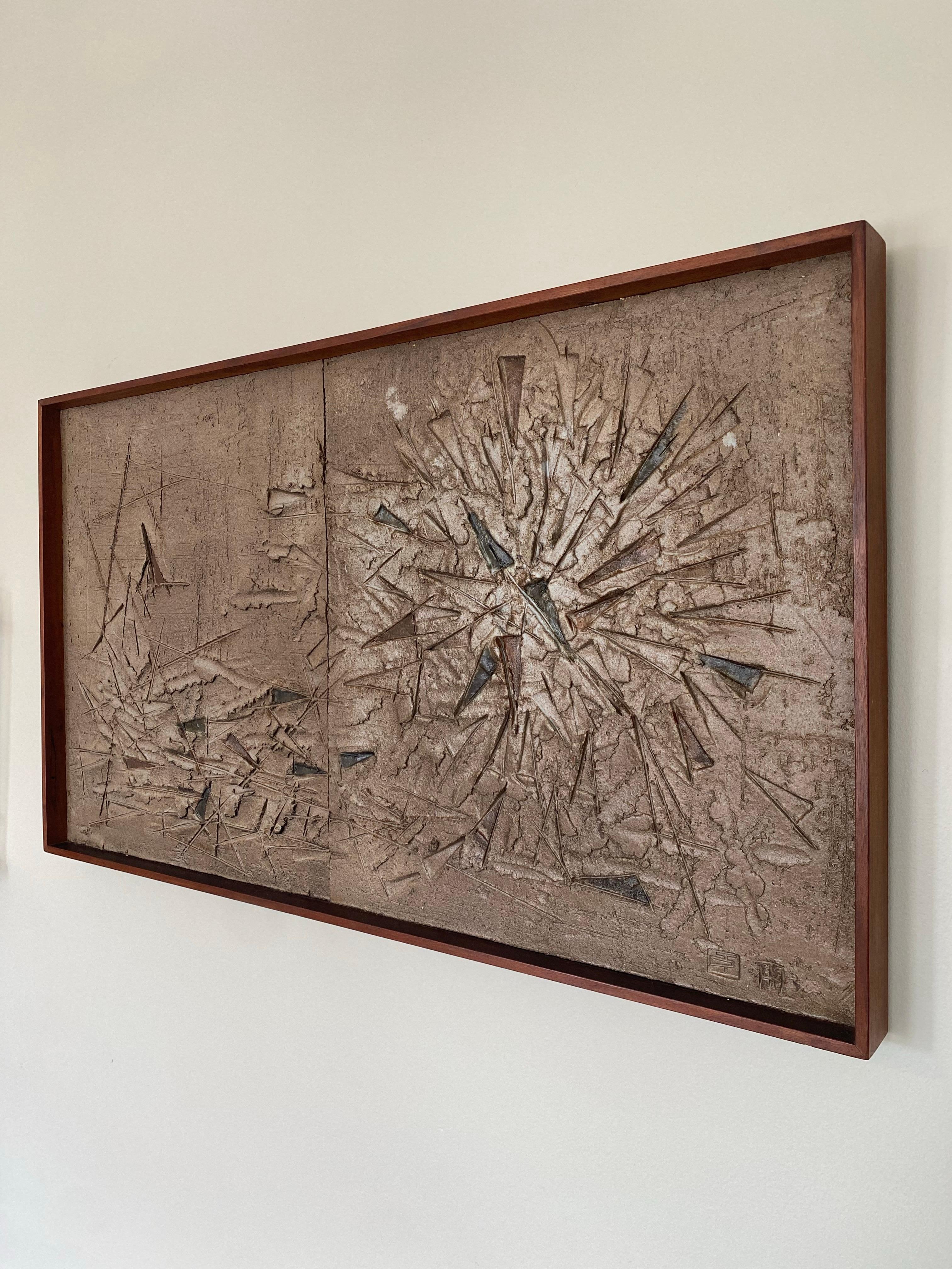 A rare, early 1960s stoneware Wall Sculpture by famed Japanese-American potter Teruo Hara for Design Technics. Signed on the lower right with Hara's TH chop mark along with the DT chop mark. This work was likely part of a joint exhibition of Hara's