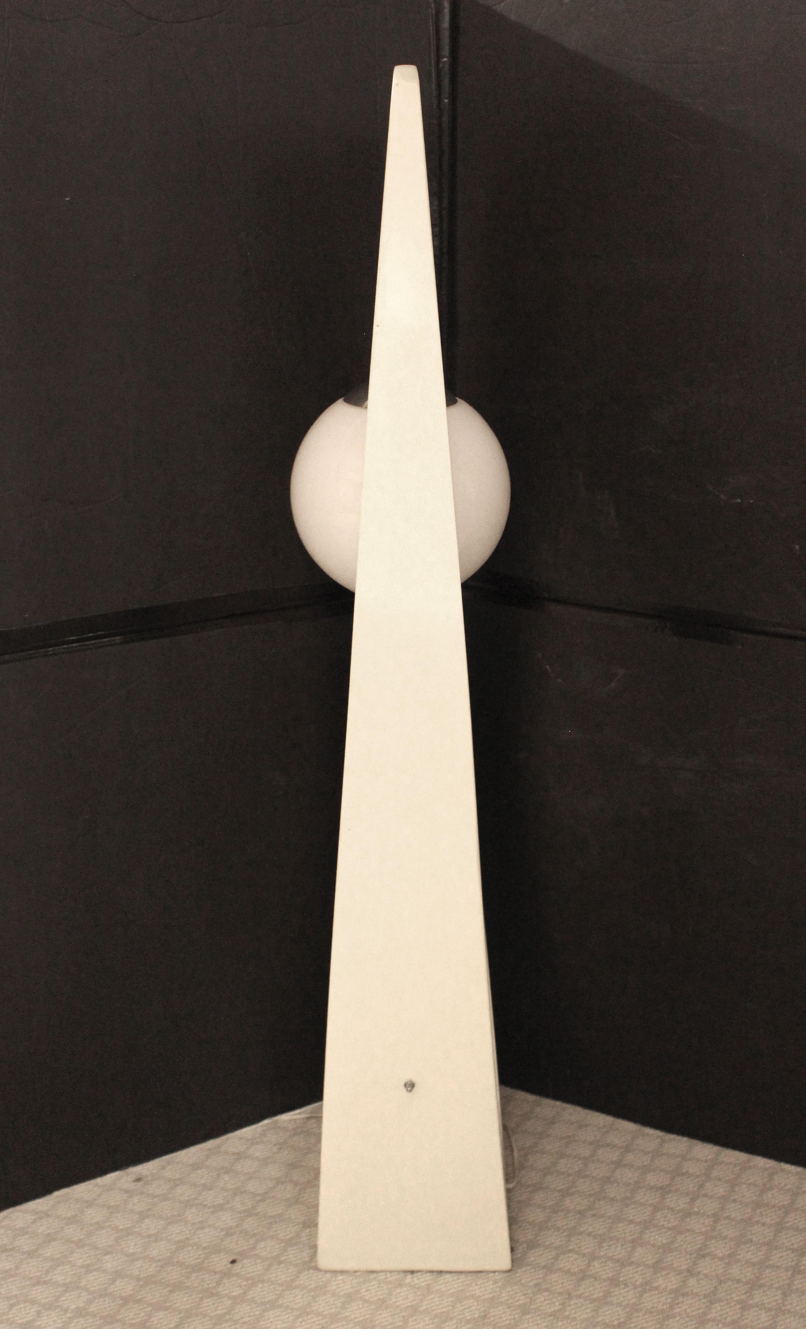 Early 1970s Modeline Lamp Company floor lamp. Creamy white with hand blown globe retaining label. Modeline made a fascinating line of sculptural bentwood lamps & chandeliers designed by top names of the era including Arthur Jacobs, Jack Haywood,