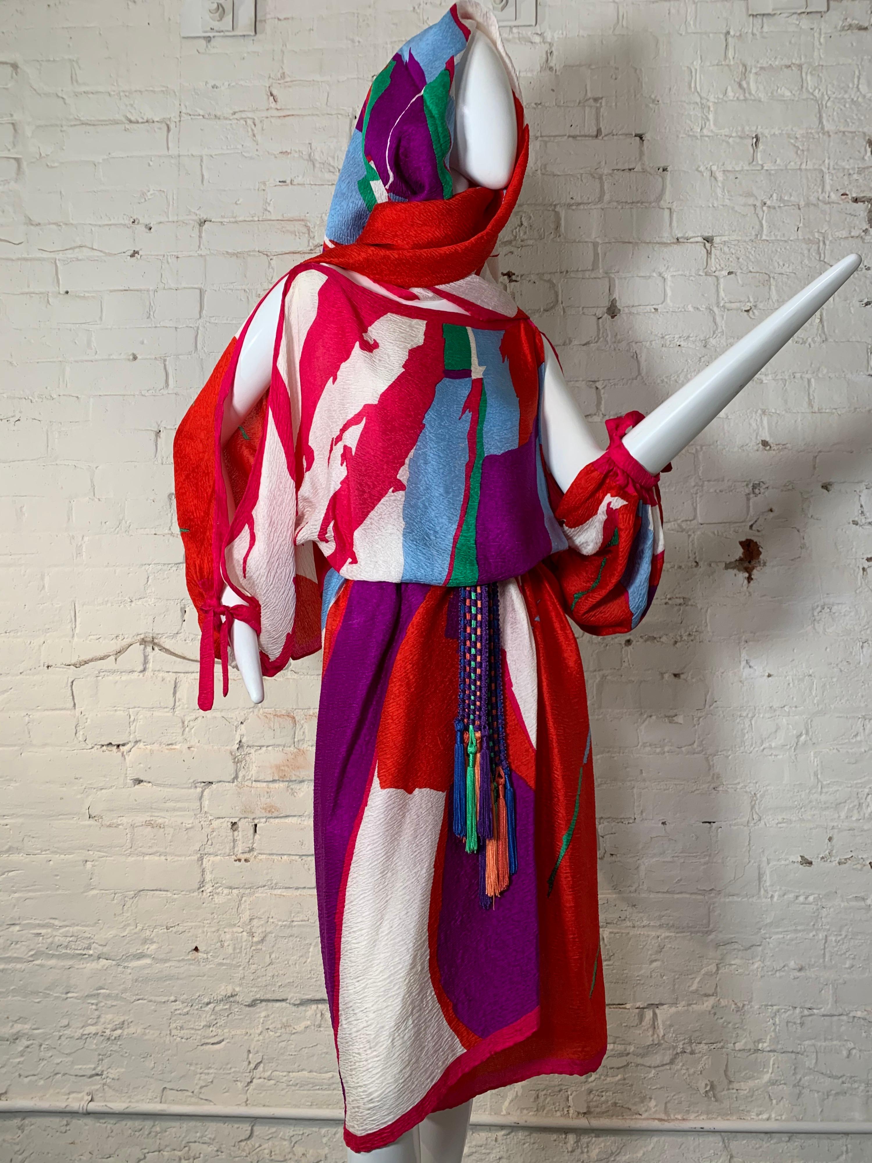 Early 1980s Halston Original abstract printed silk pongee dress and matching large scarf ensemble in red, blue, purple, green and white. Dress has balloon sleeves that are open from shoulder to gathered cuff. Included is a Yves Saint Laurent braided