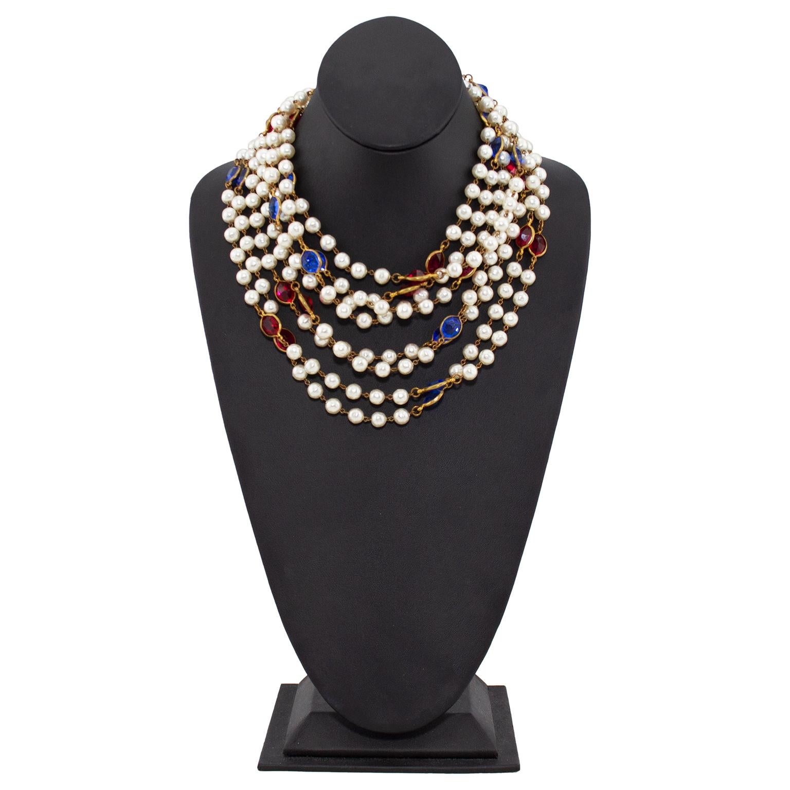Incredible and show stopping Chanel Haute Couture sautoir featuring faux pearls with oval shaped blue and red poured glass beads in between every six pearls. Gold tone metal chain and settings. Measures a whopping 75.5