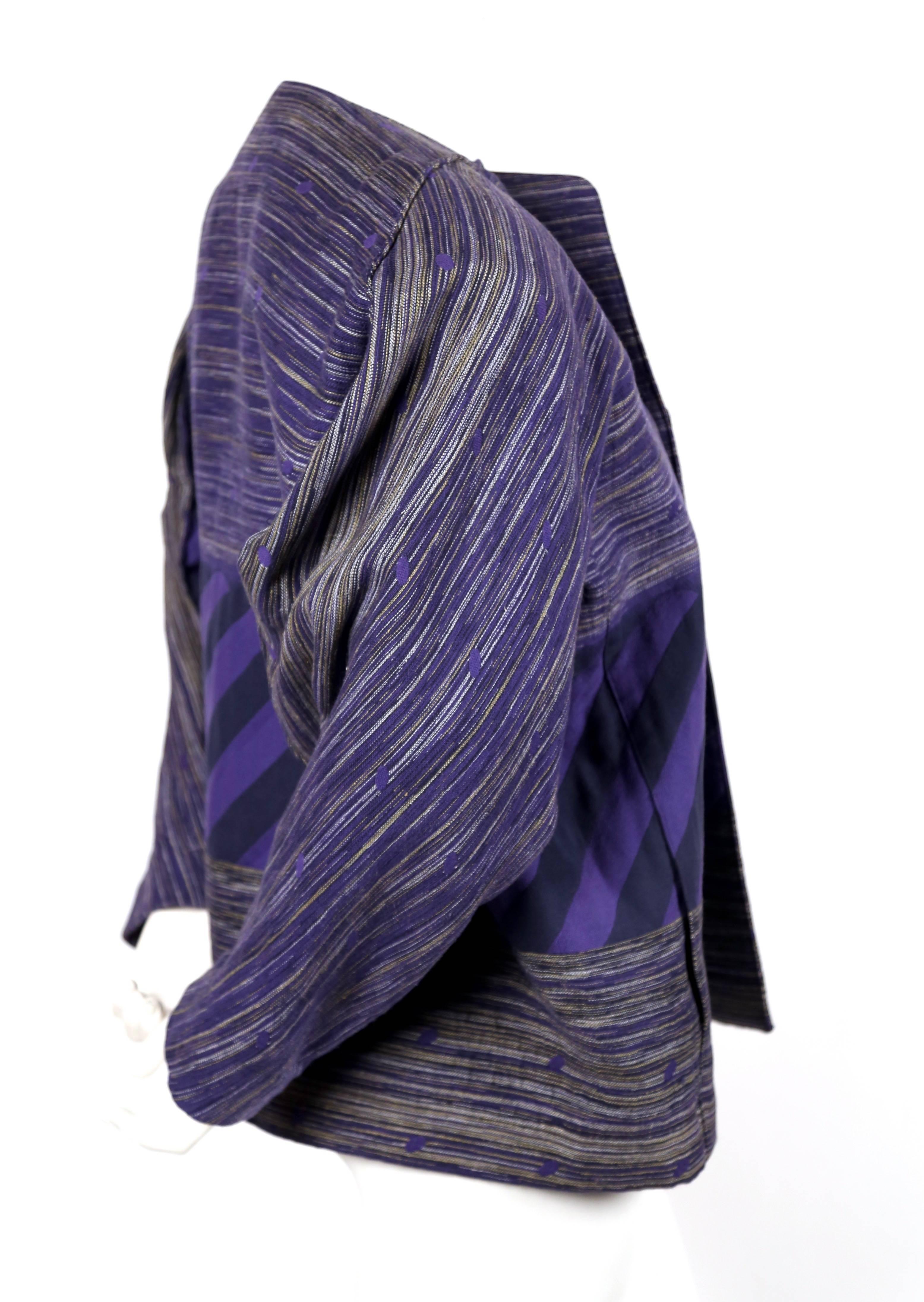Vividly colored woven striped jacket from Issey Miyake dating to 1982 exactly as seen on the spring runway. Size 'M'. Approximate measurements: bust 50