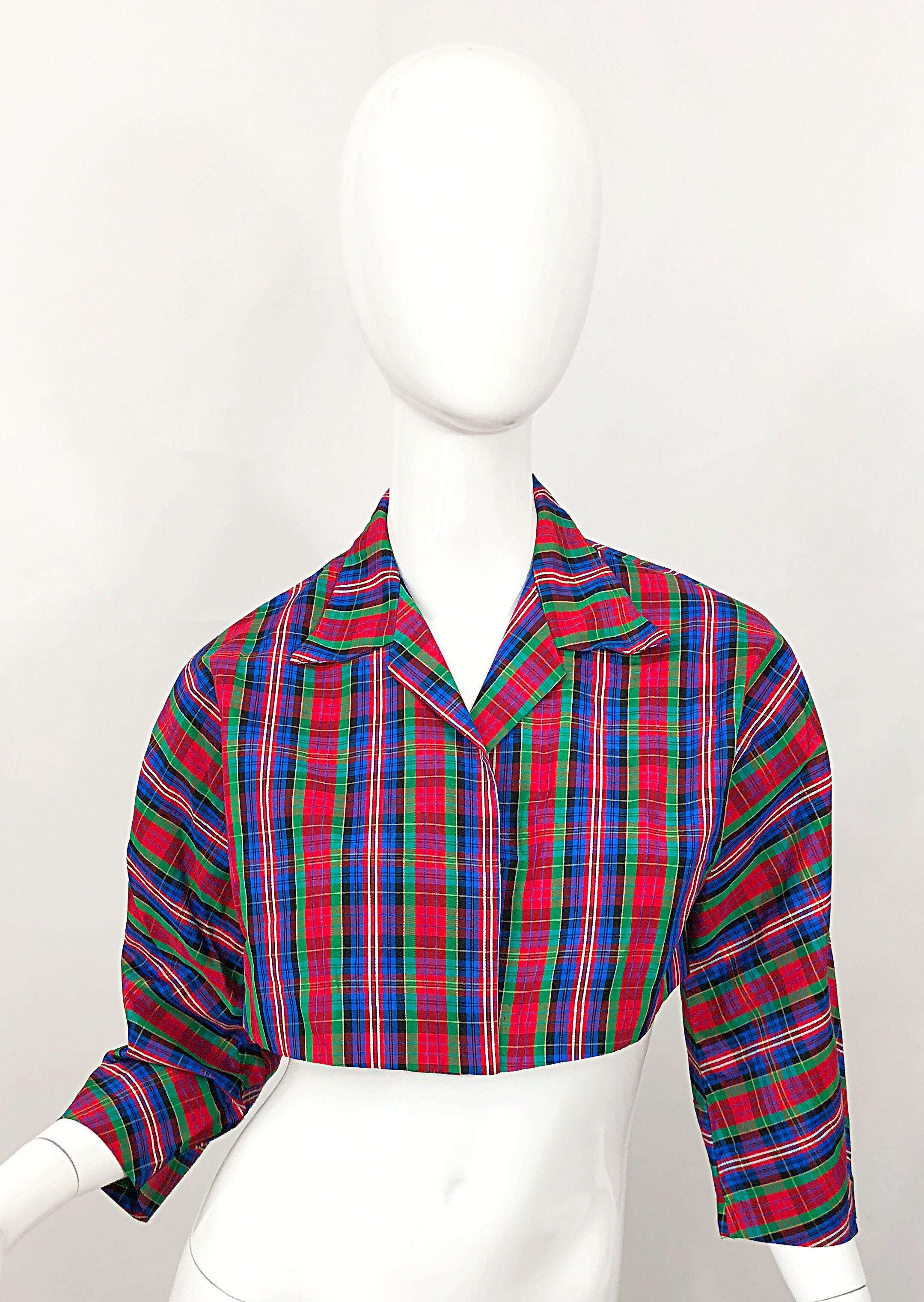 Chic early 90s BETSEY JOHNSON red, blue and green plaid cropped taffeta bolero jacket! Features a classic plaid that is perfect any time of year. Flattering pleating detail on back forms a good shape. Open front. In great condition. Made in