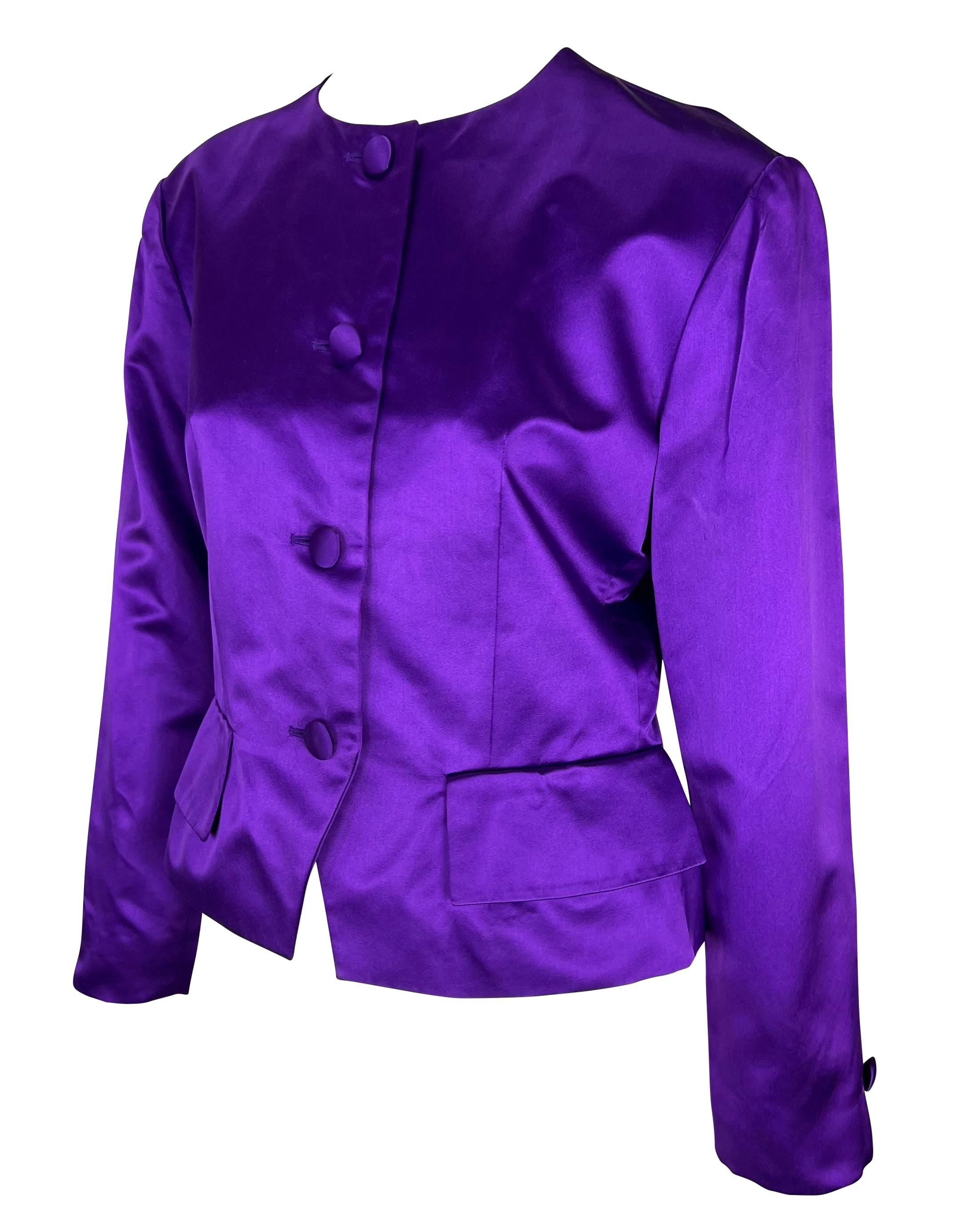 Presenting a beautiful deep purple silk satin Christian Dior Boutique jacket, designed by Gianfranco Ferré. From the early 1990s, this entirely silk satin jacket features a crew neckline, button-down closures, and pockets at the hips. This luxurious