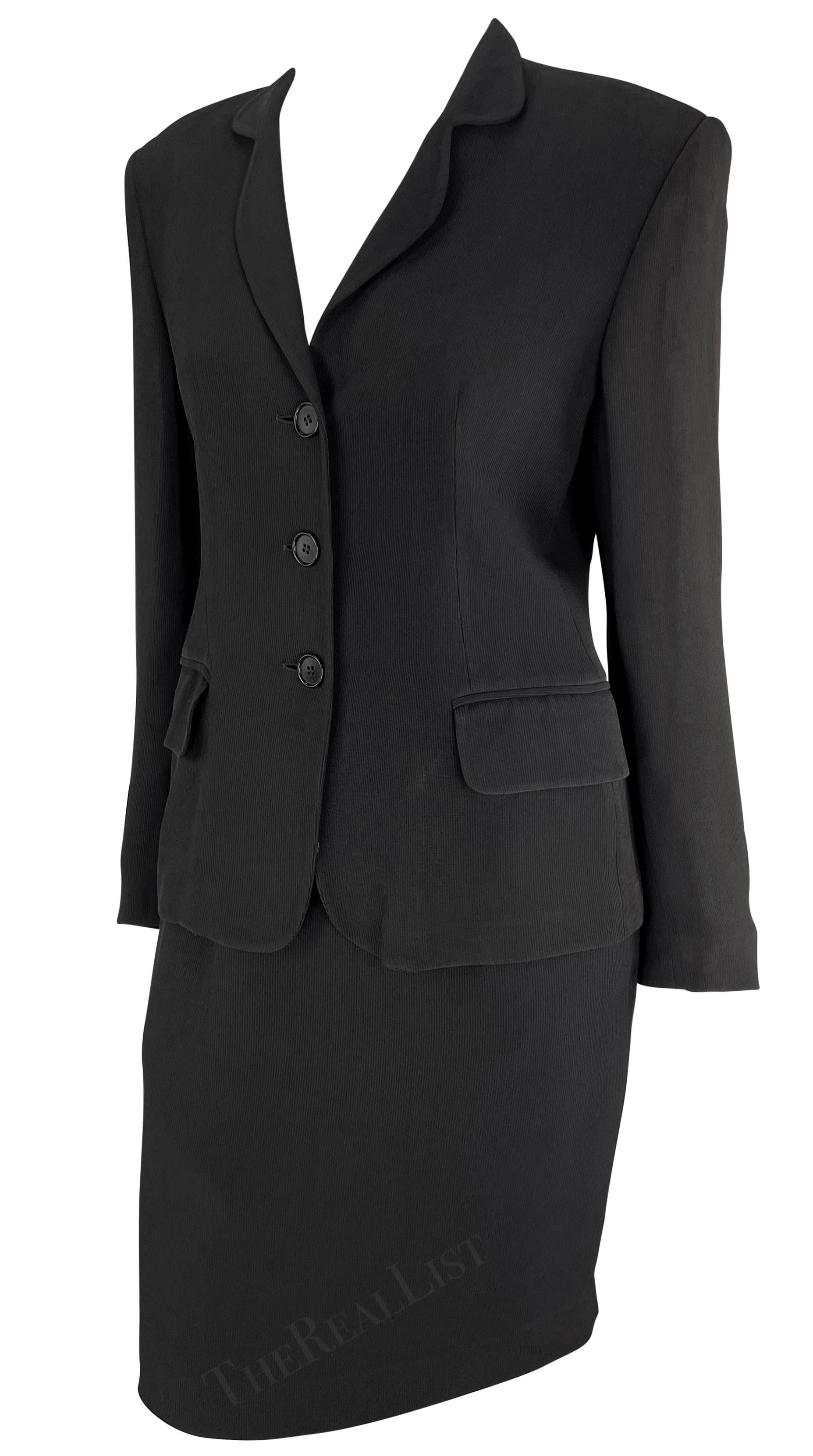Presenting a chic black Gucci skirt suit. From the early 1990s, this classic black skirt suit is constructed of a blazer and matching pencil skirt.

Approximate measurements:
Jacket Size -  42IT
Shoulder to cuff: 24