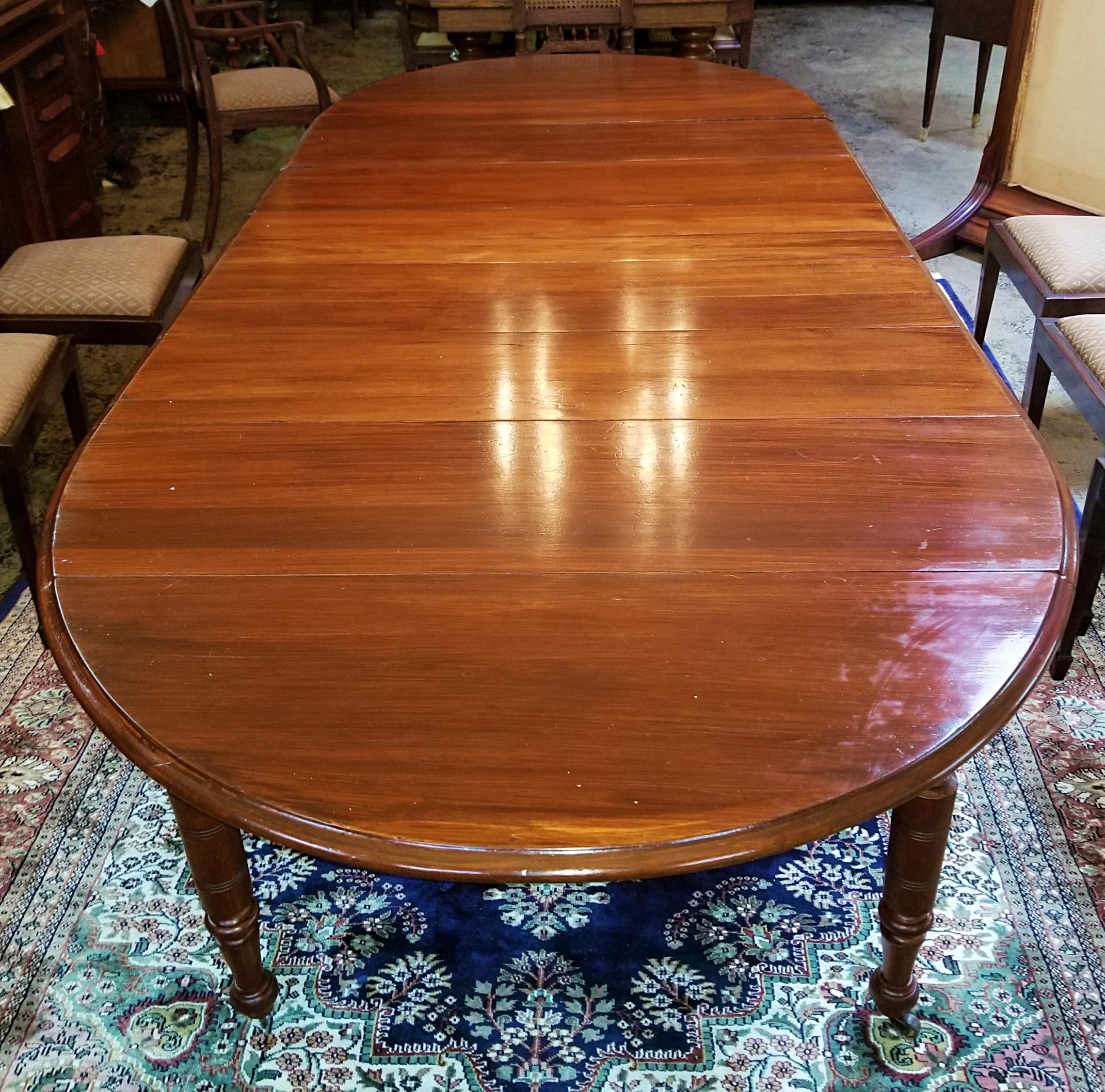 Presenting a stunning early 19th century American cherry extendable dining table.

From circa 1800-1820 and made of solid cherrywood.

The table has 7 removeable leaves and can be used as a side or center table as well as a dining table.


Beautiful