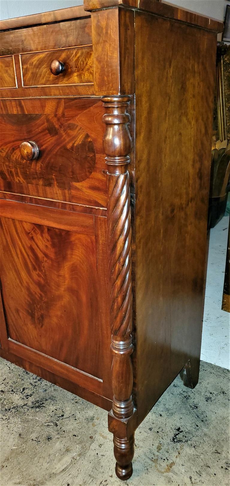 Early 19th Century American Empire Flame Mahogany Cabinet 1