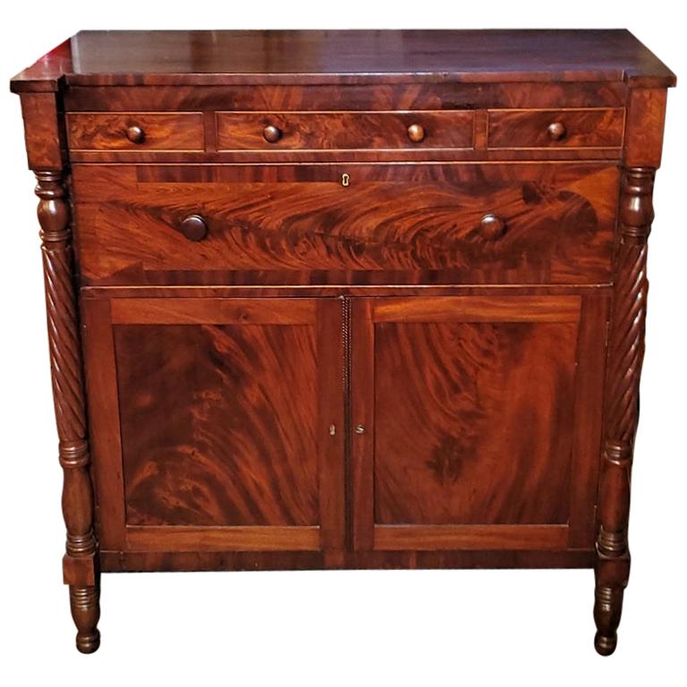 Early 19th Century American Empire Flame Mahogany Cabinet