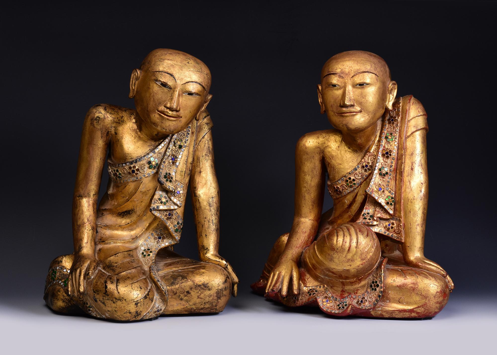 A pair of very rare and superb antique Burmese lacquer seated disciples with gilding and glass inlay.

Age: Burma, Early Mandalay Period, Early 19th Century
Size: Height 39 - 40 C.M. / Width 29 - 31 C.M.
Condition: Nice condition overall (some