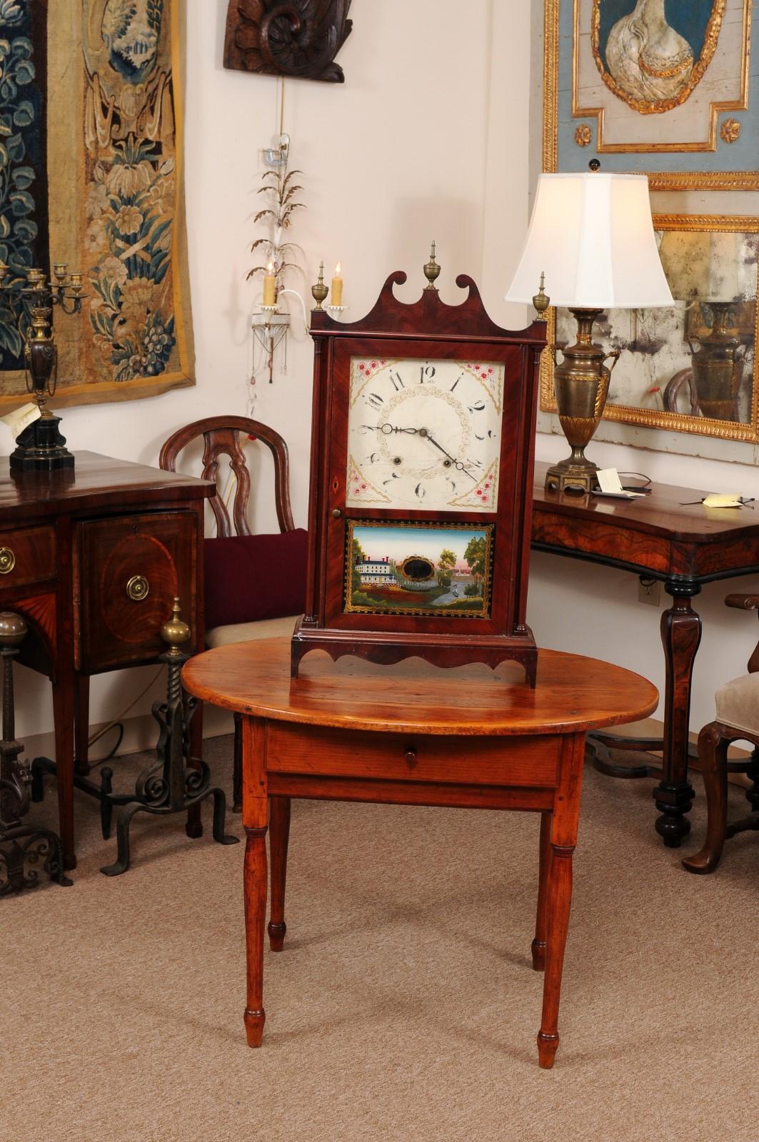 Early 19th C. American Pillar & Scroll Clock in Mahogany with Eglomise Landscape In Good Condition For Sale In Atlanta, GA