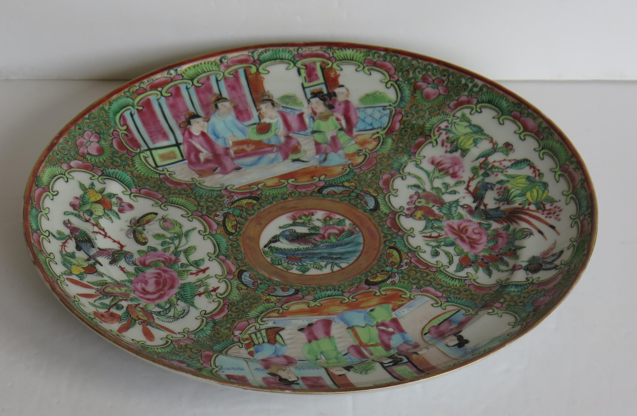 This is a very decorative, good quality Chinese export, porcelain, Rose Medallion Dinner Plate, which we date to the early 19th century, Qing dynasty, circa 1820.

The dinner plate is well potted with a central well and a fairly large diameter of