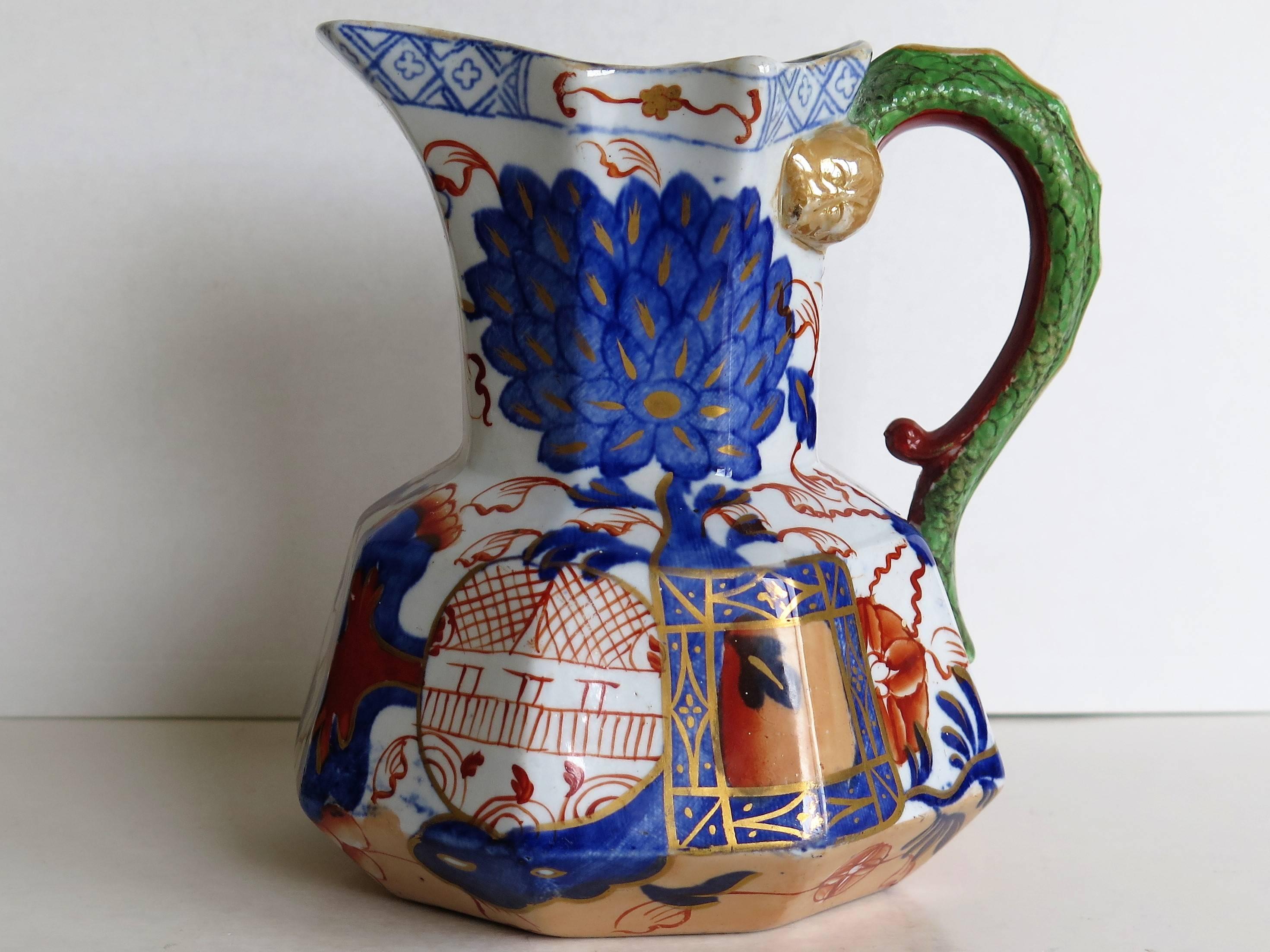 This is a good Hydra jug or Pitcher made by the Davenport Company of Longport, Staffordshire, England in the late Georgian period, circa 1805-1820, made of Ironstone pottery, which Davenport called Stone China.

It is hand decorated in a bold Imari