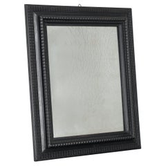 Early 19th C. Ebonised Tuscan Ripple Mirror