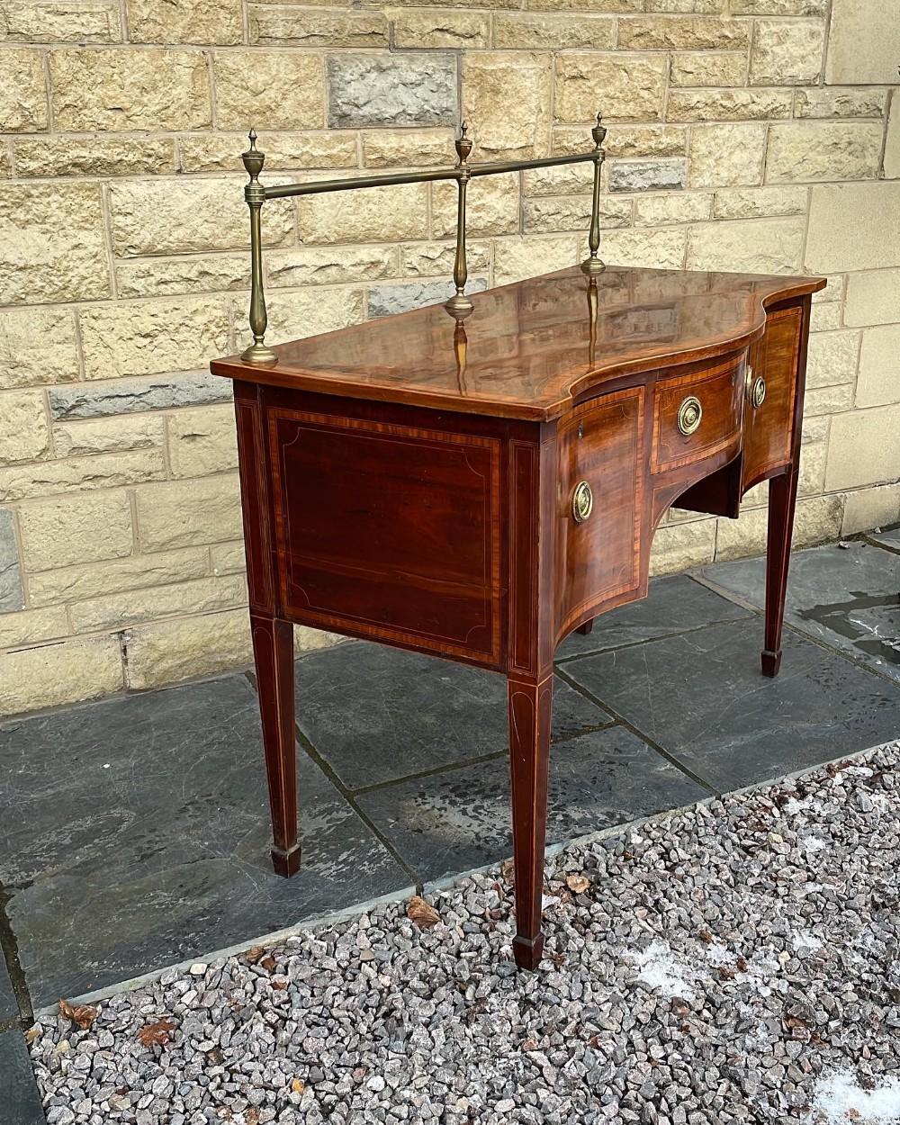 Hepplewhite  Early 19th C. English Inlaid Figured Mahogany Hepp. Style Serpentine Sideboard For Sale