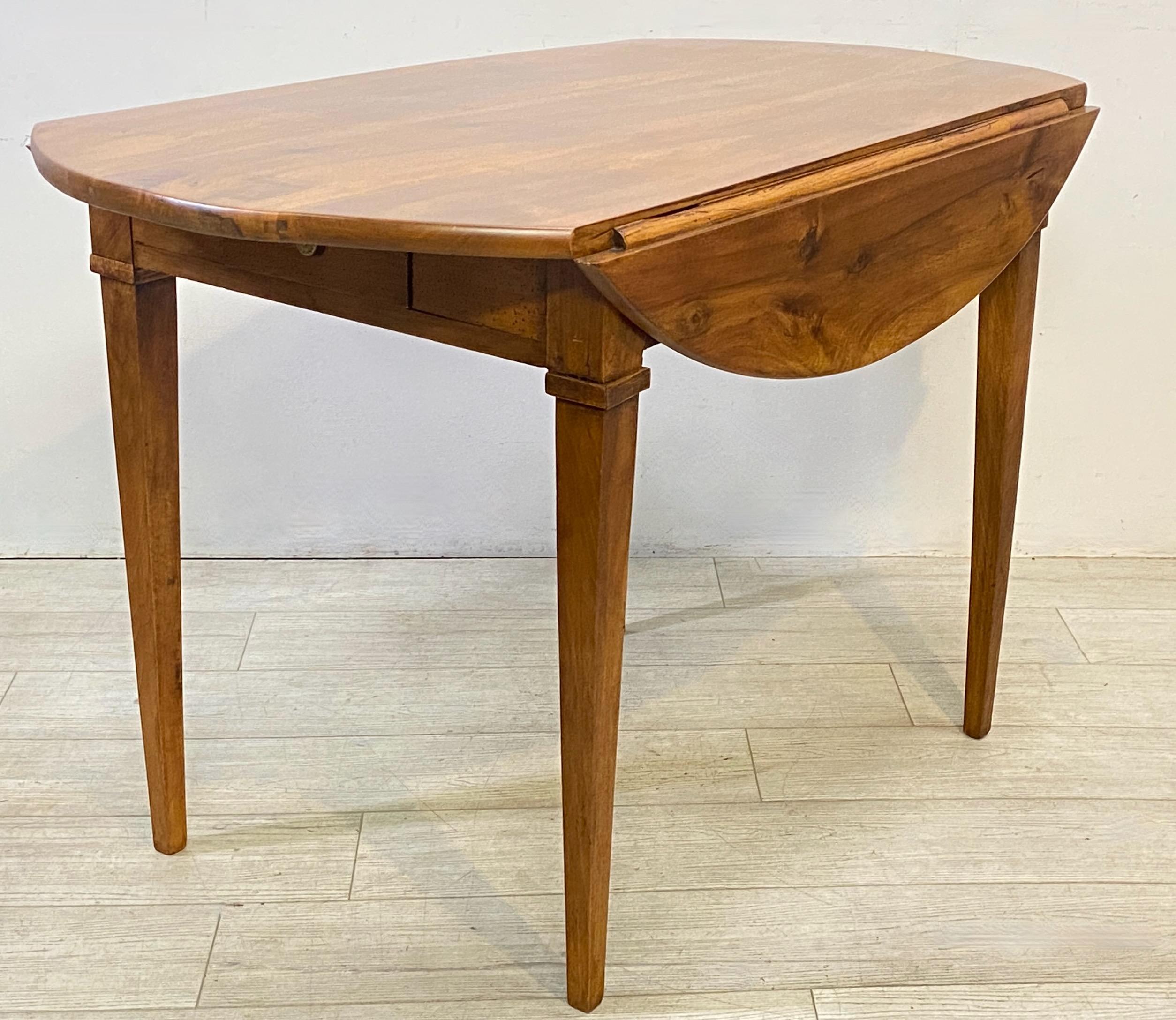 Rustic Early 19th C French Cherry Wood Elliptical Drop Leaf Dining Table, circa 1800 For Sale