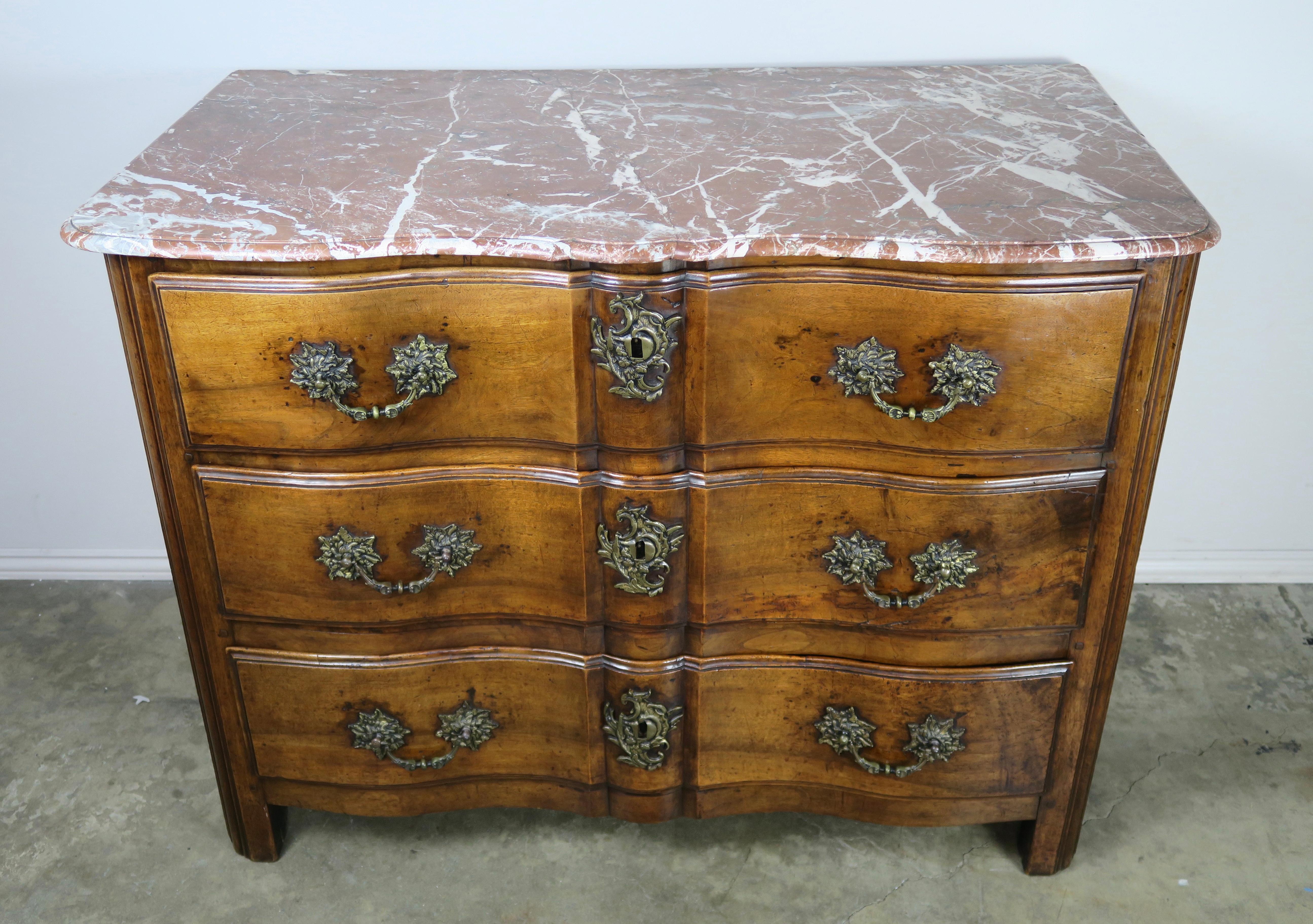 19th century walnut French 3-drawer chest with original cast bronze hardware. Original marble top with single ogee and bull nose edge detail.