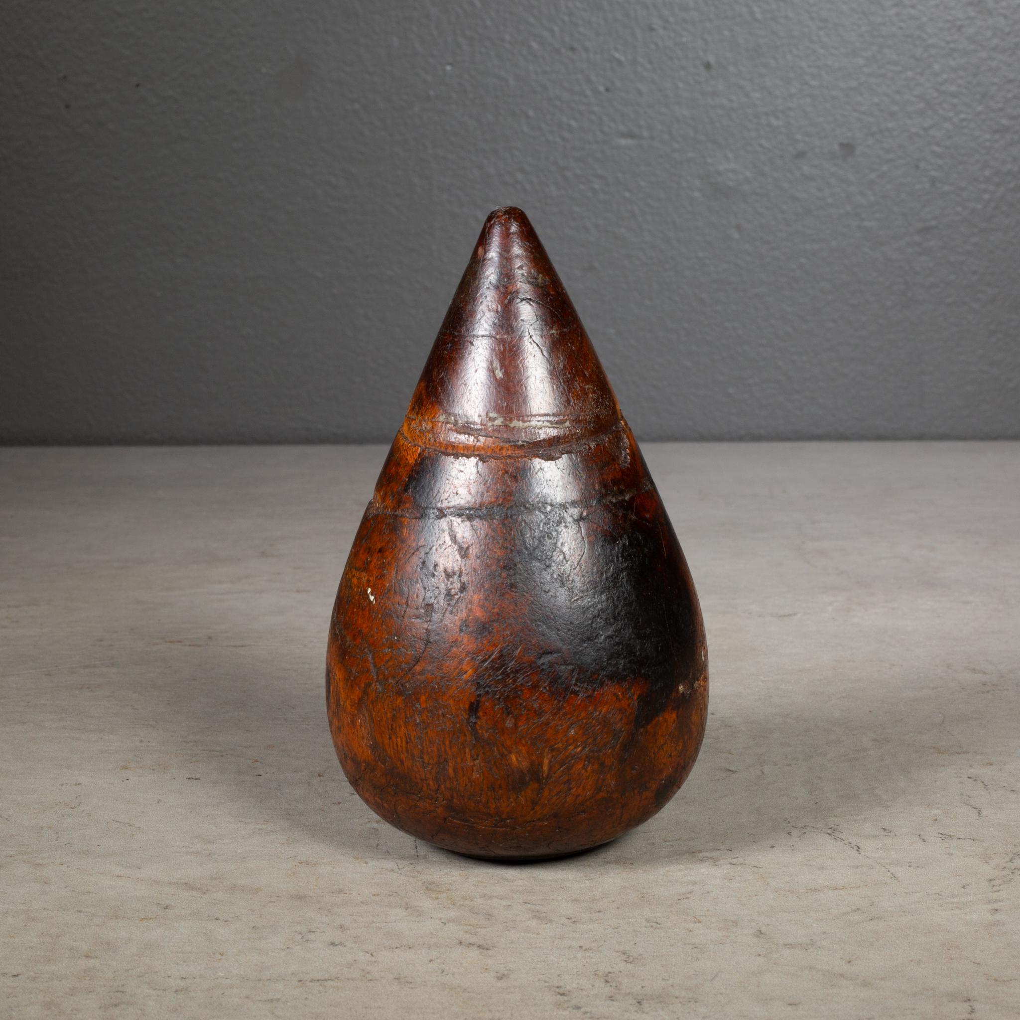 ABOUT

A 19th century plumber's turnpin, which came in all sizes, usually made of a hard wood such as Lignum Vitae. Used for opening up the ends of lead pipes, hence the indented lines on the piece. 

    CREATOR Unknown.
    DATE OF MANUFACTURE