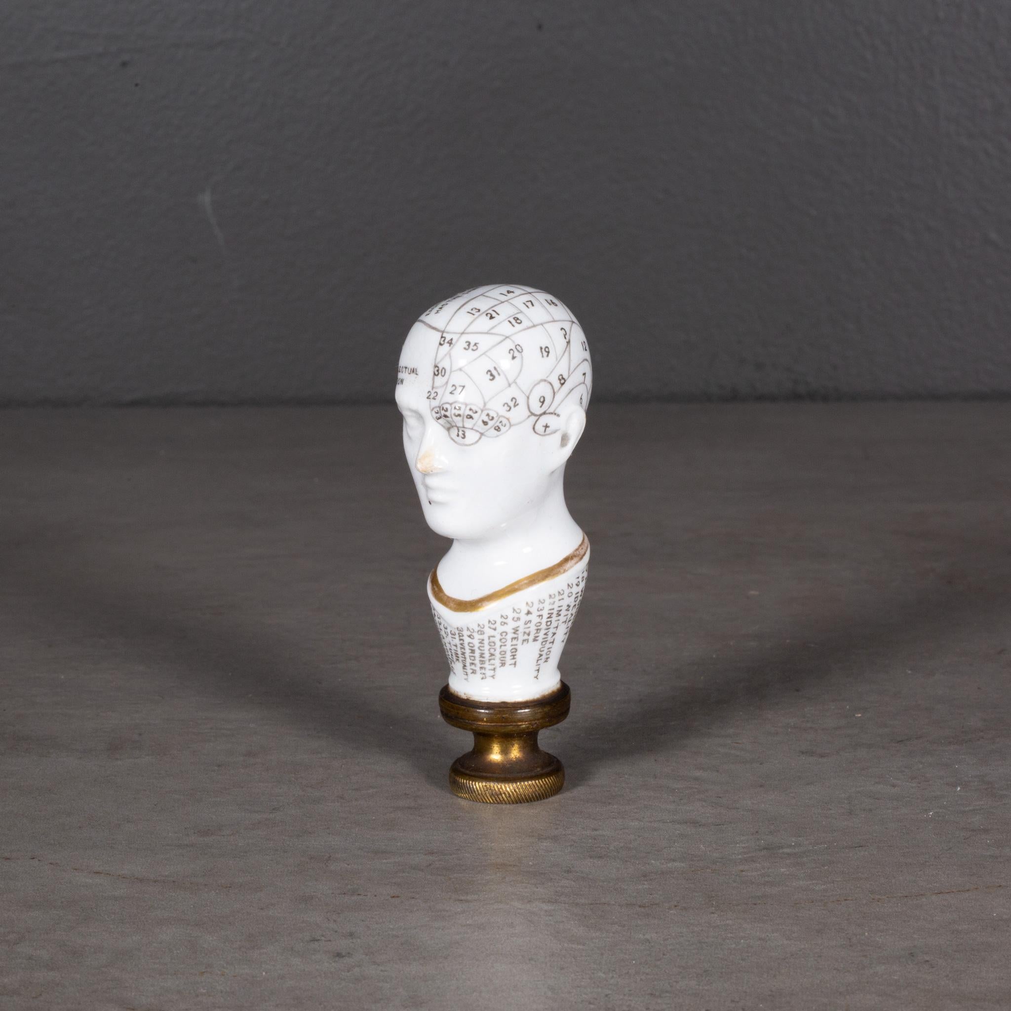 ABOUT

​A 19th-century English porcelain letter seal in the form of a phrenological head. ​The areas of the skull numerically demarcated with the key surrounding the neck. Gilt accent around the neck and mounted on a brass base.

A rare English