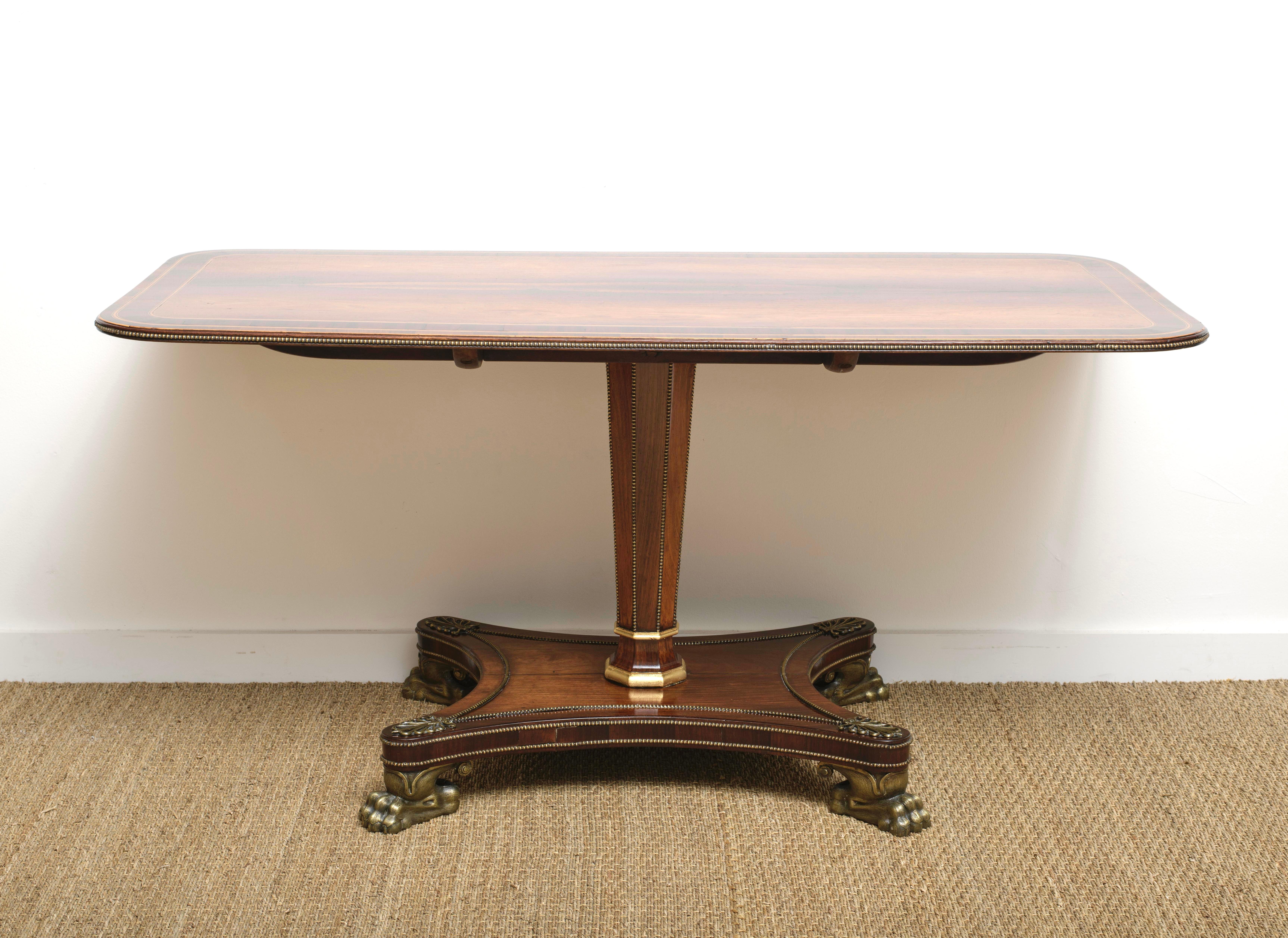 Striking Early 19th C. Regency Period Rosewood and Beaded Brass inlay Breakfast Table, on pedestal  with matching inlay resting on base with typical Regency decoration and Lion Paw solid brass feet.  