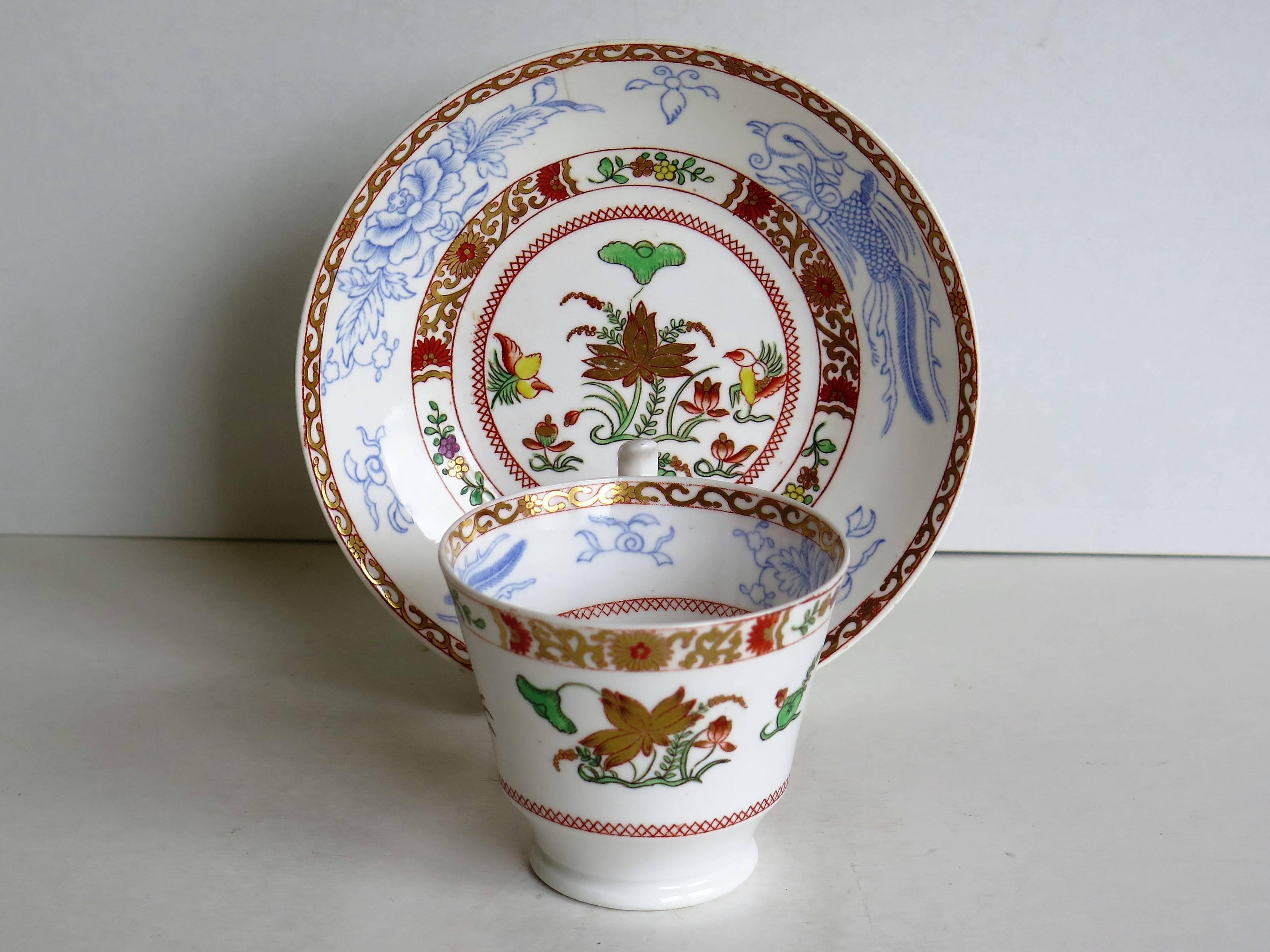 This is a fine porcelain coffee cup and saucer made by Spode, England and dates to the early 19th century, circa 1815.

The cup has the The ‘London’ shape with a curvy 