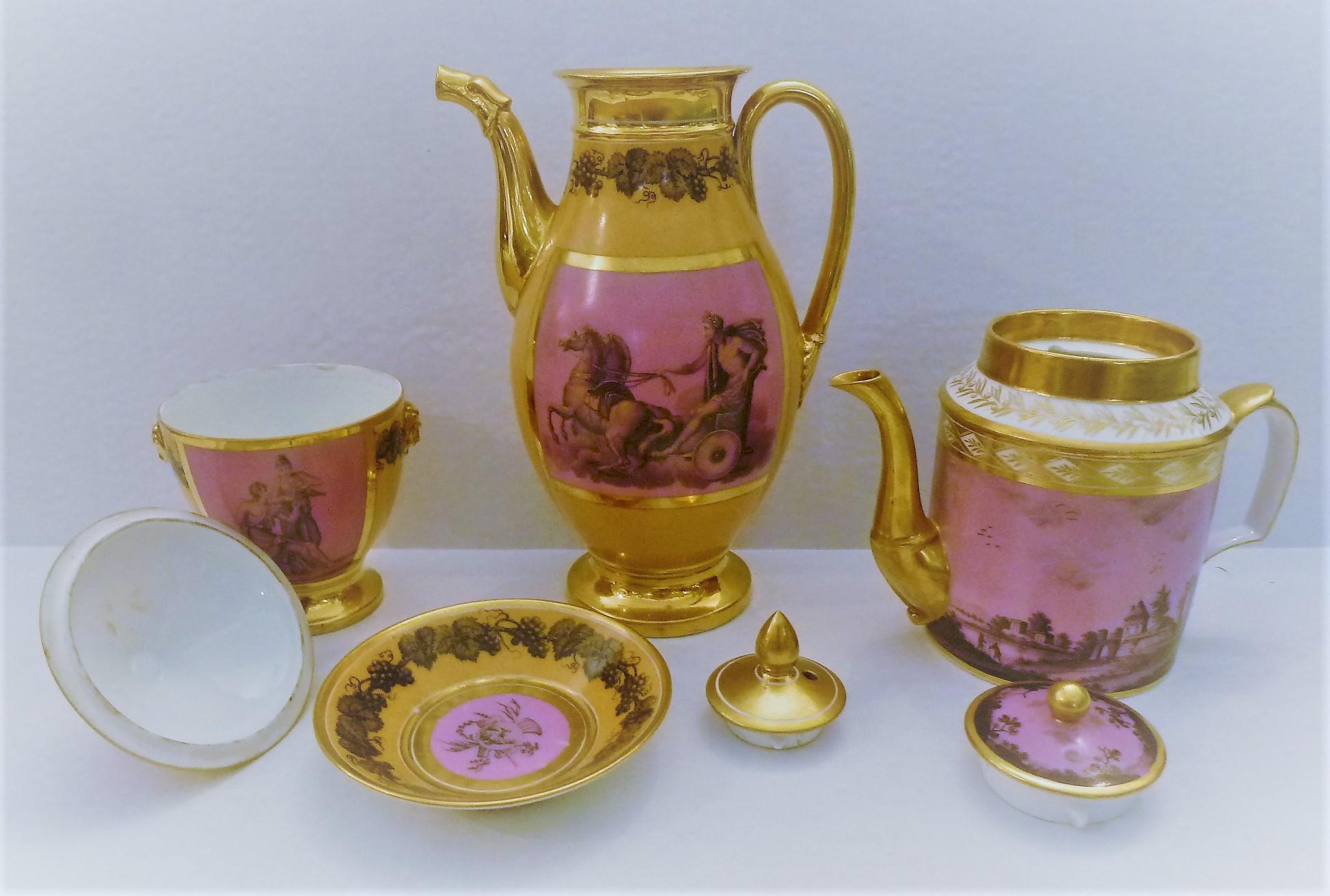 Early 19th century Paris porcelain coffee, tea and sugar items. All three pieces feature delicately hand painted scenes. Accented with gilt decoration.