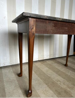 Early 19th cent. American federal period cherry slab table with black marble top