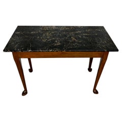 Early 19th cent. American federal period cherry slab table with black marble top