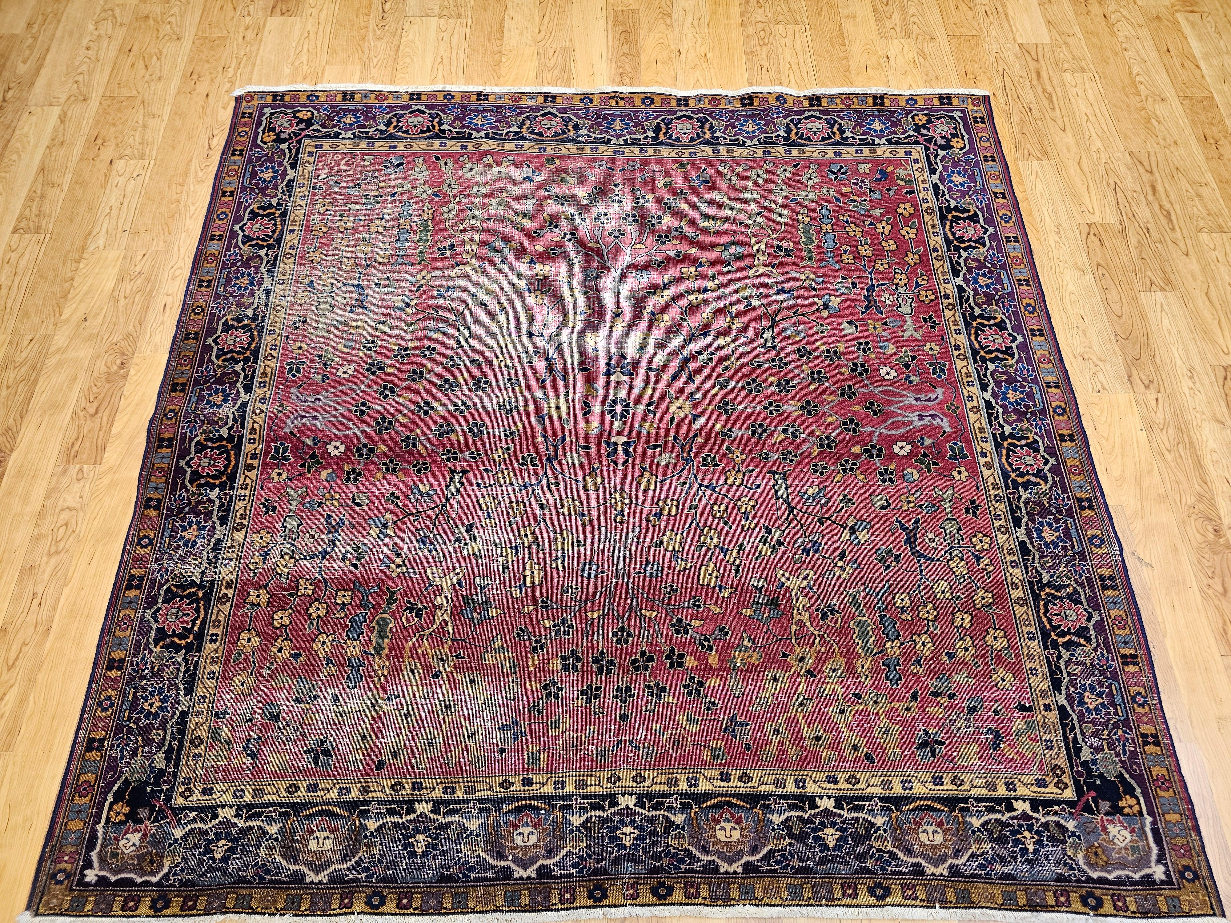 Exceptional Early 19th Century Agra Area Rug in an all over floral pattern in magenta-red field with an eggplant color bor is a rare and remarkable testament to centuries of artistry and tradition.
This magnificent Agra rug is in overall good