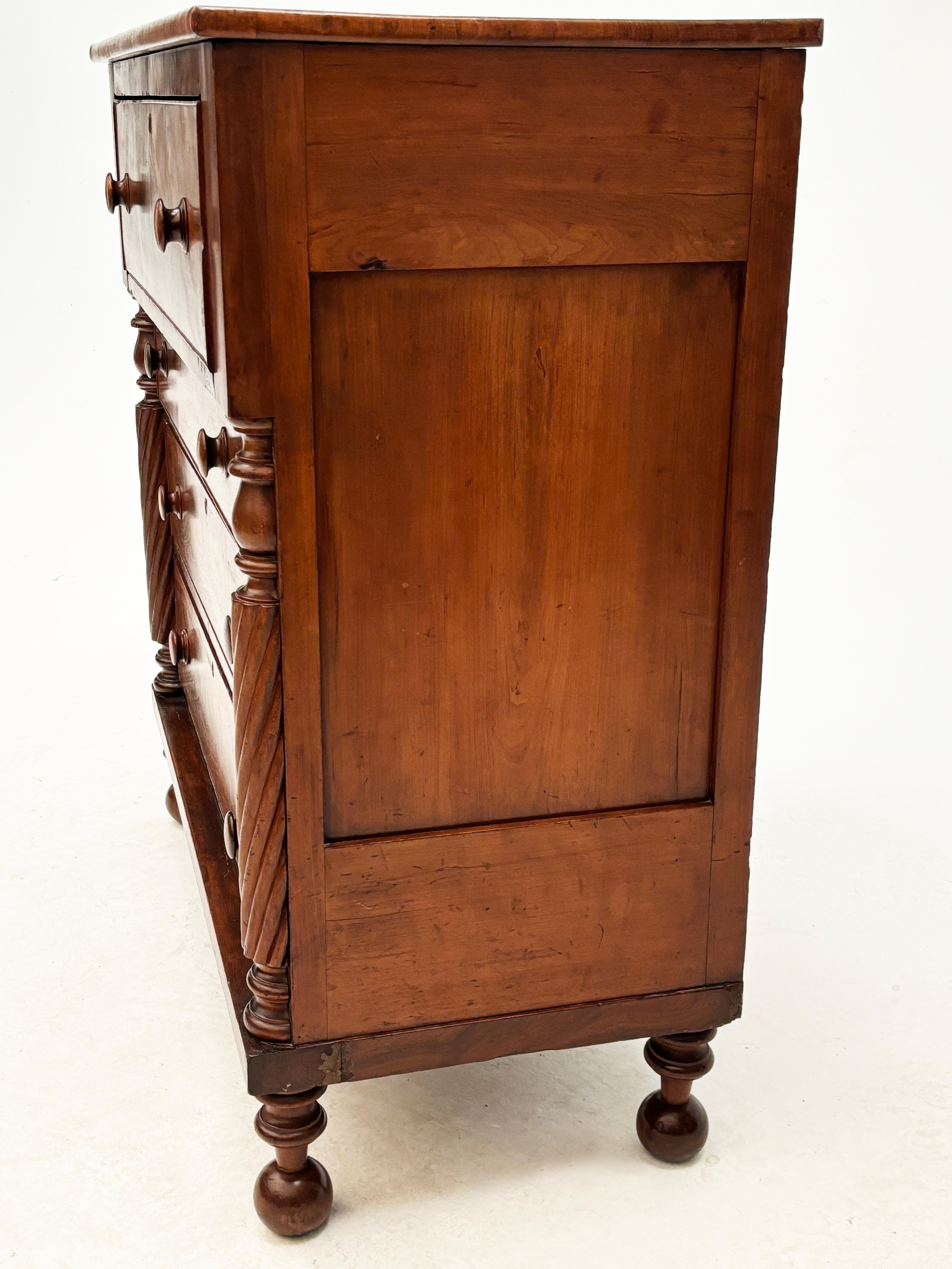 Early 19th Century American Empire Figured Cherry Chest of Drawers 8
