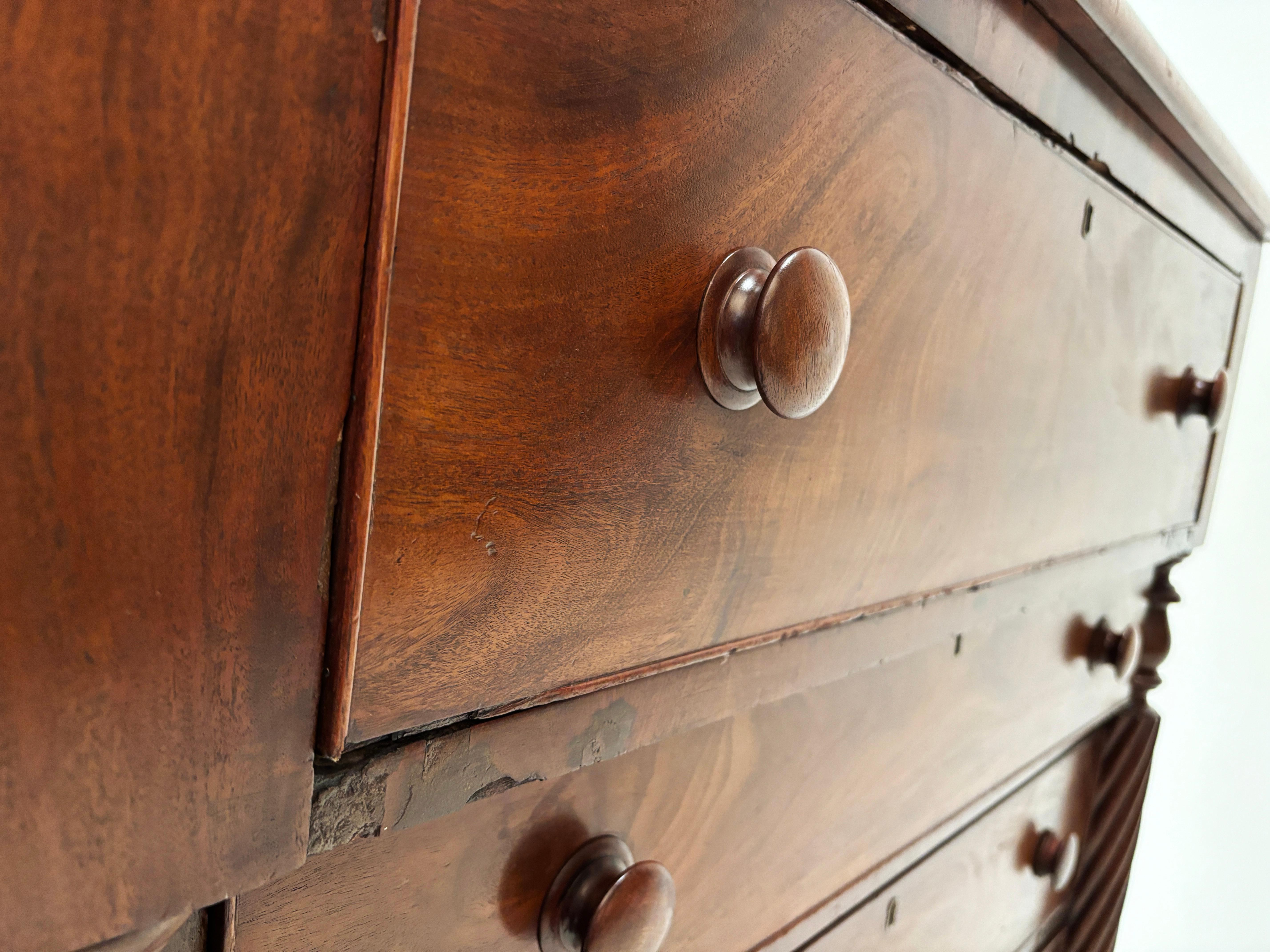 Early 19th Century American Empire Figured Cherry Chest of Drawers 10