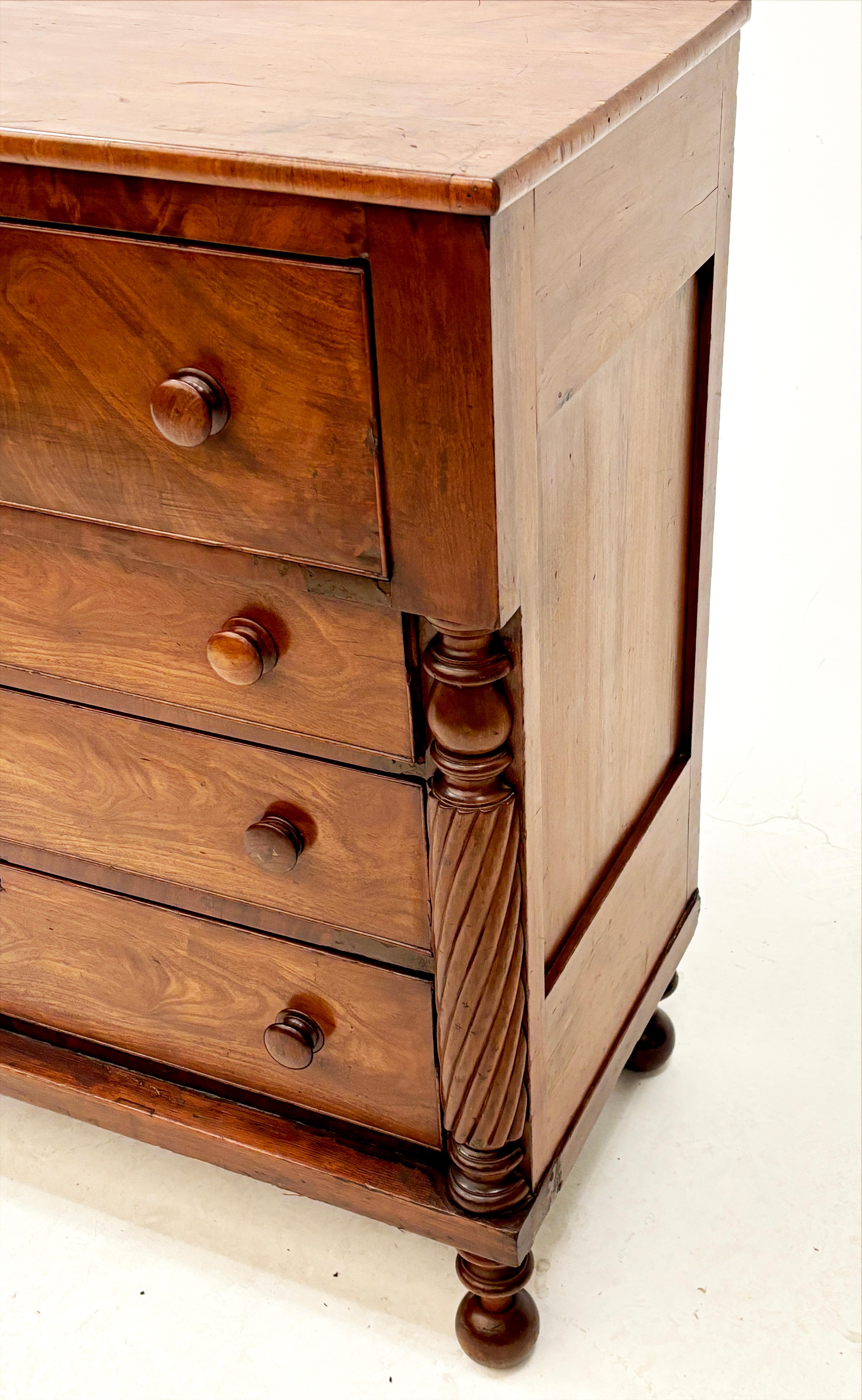 Early 19th Century American Empire Figured Cherry Chest of Drawers 1